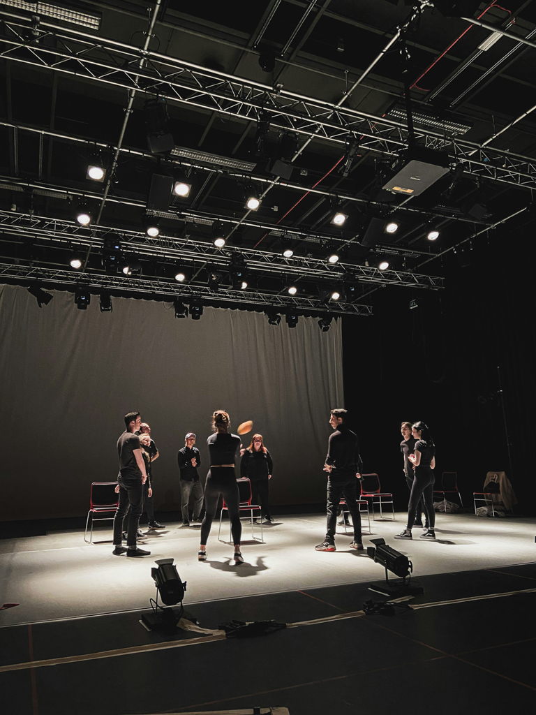 Performers practicing for a role
