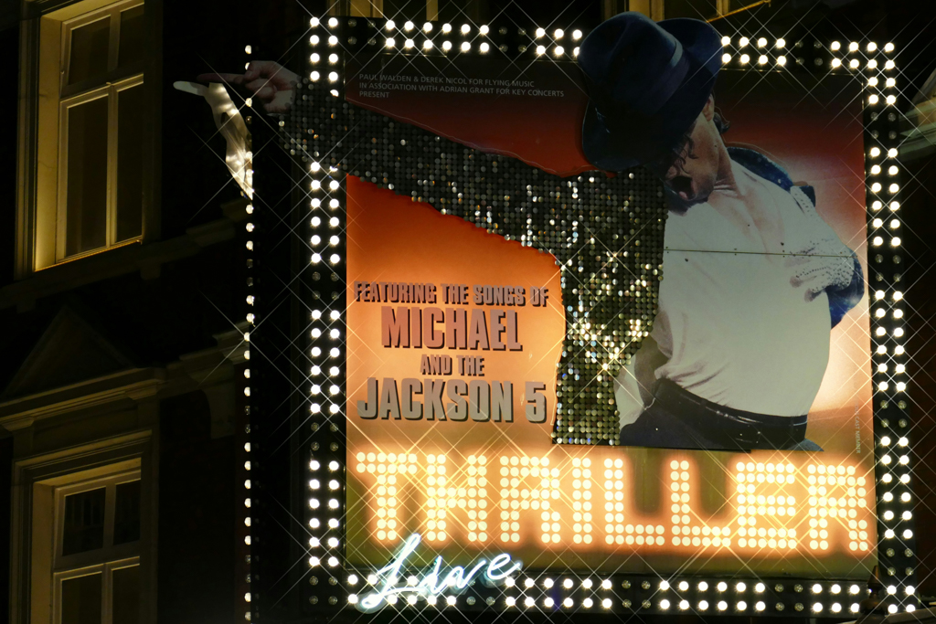 Advertisement for Musical Theatre in downtown setting