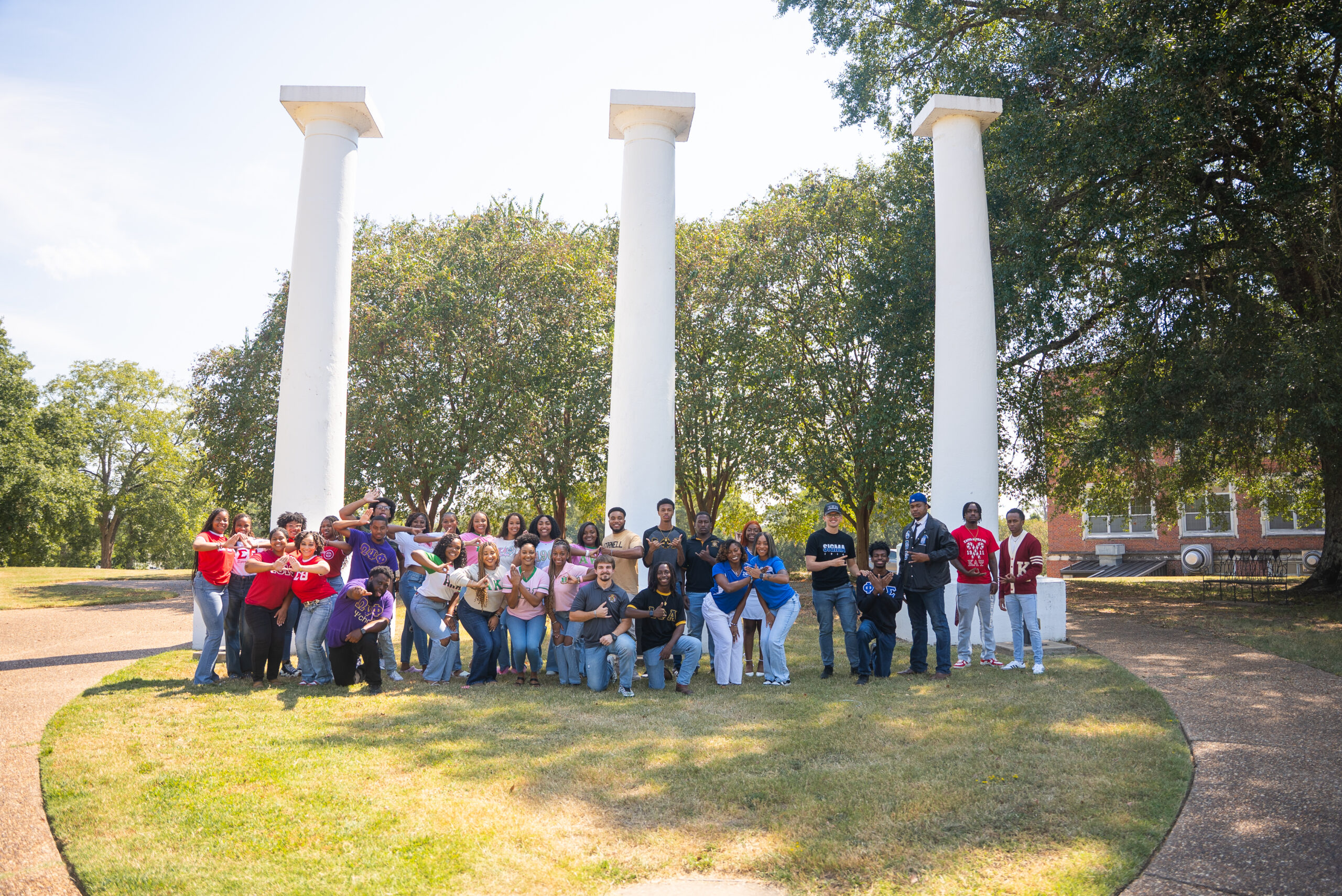 students posed by NSU columns