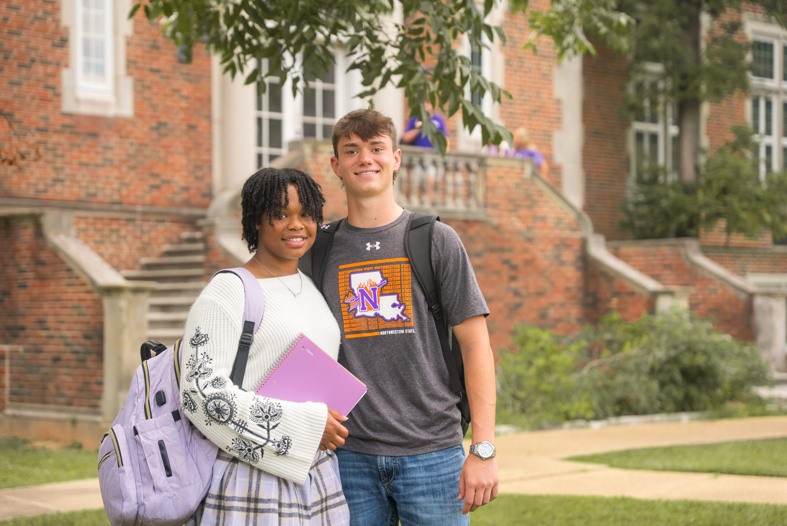 students studying on campus