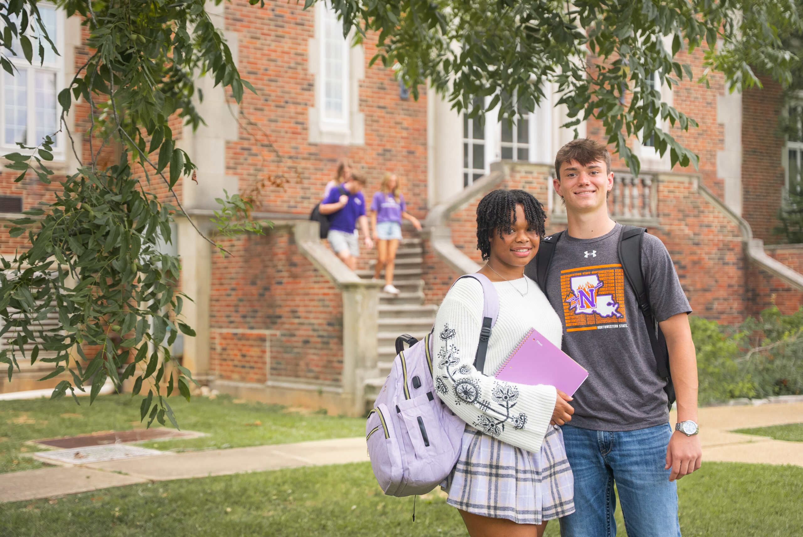 students studying on campus