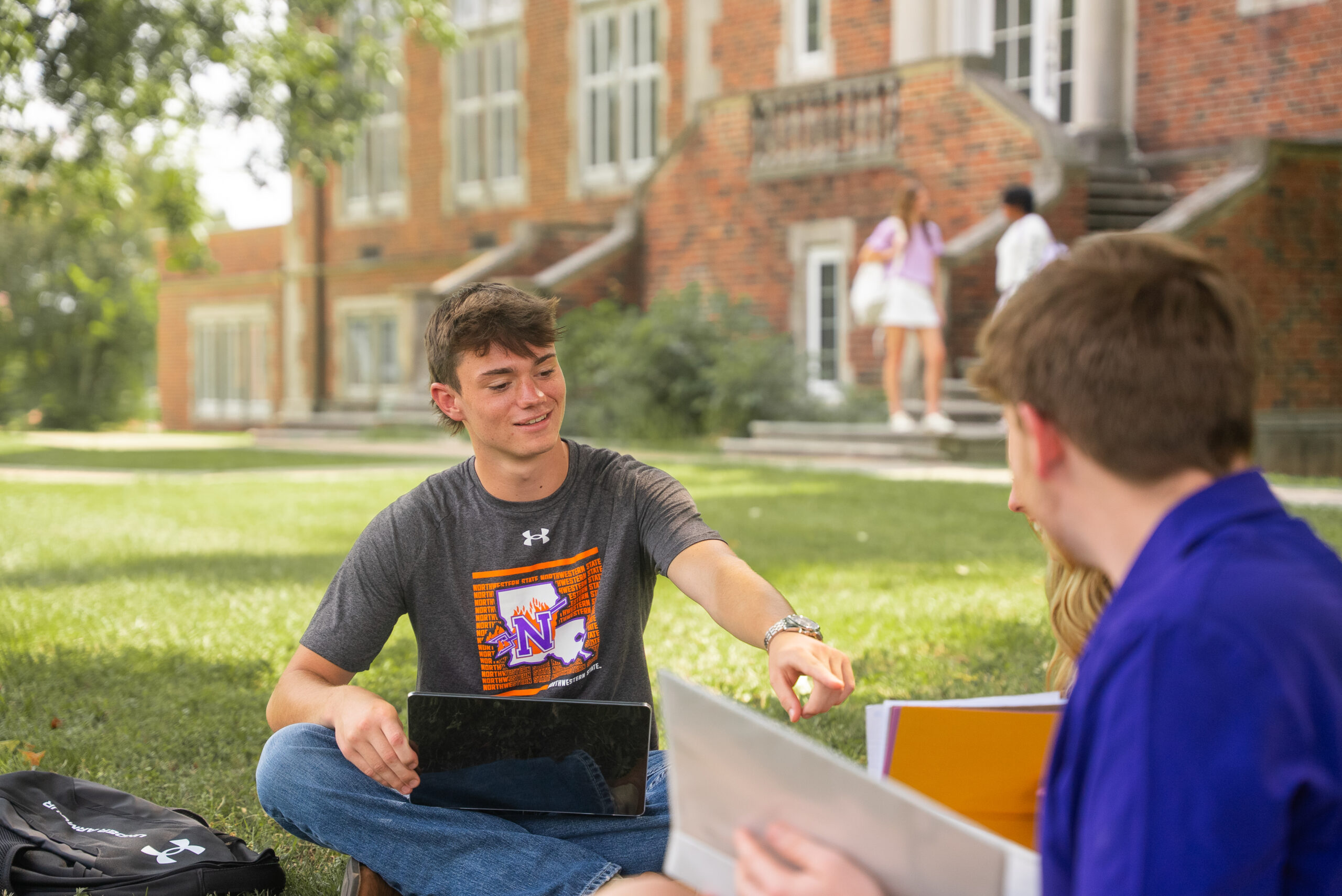 students studying on campus