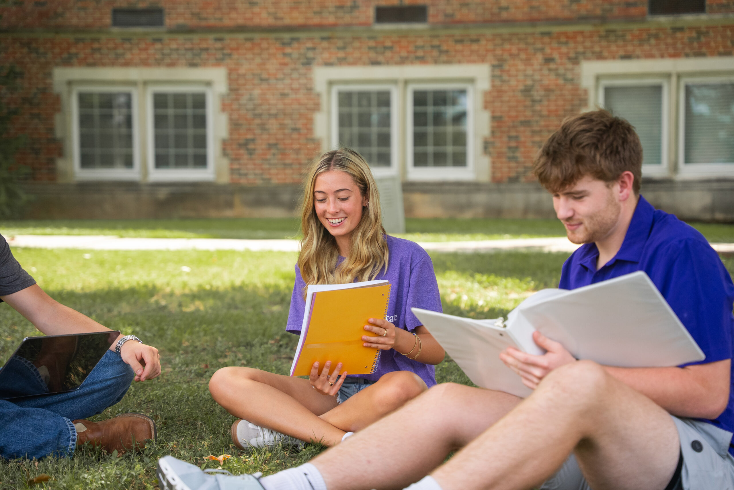 students studying on campus
