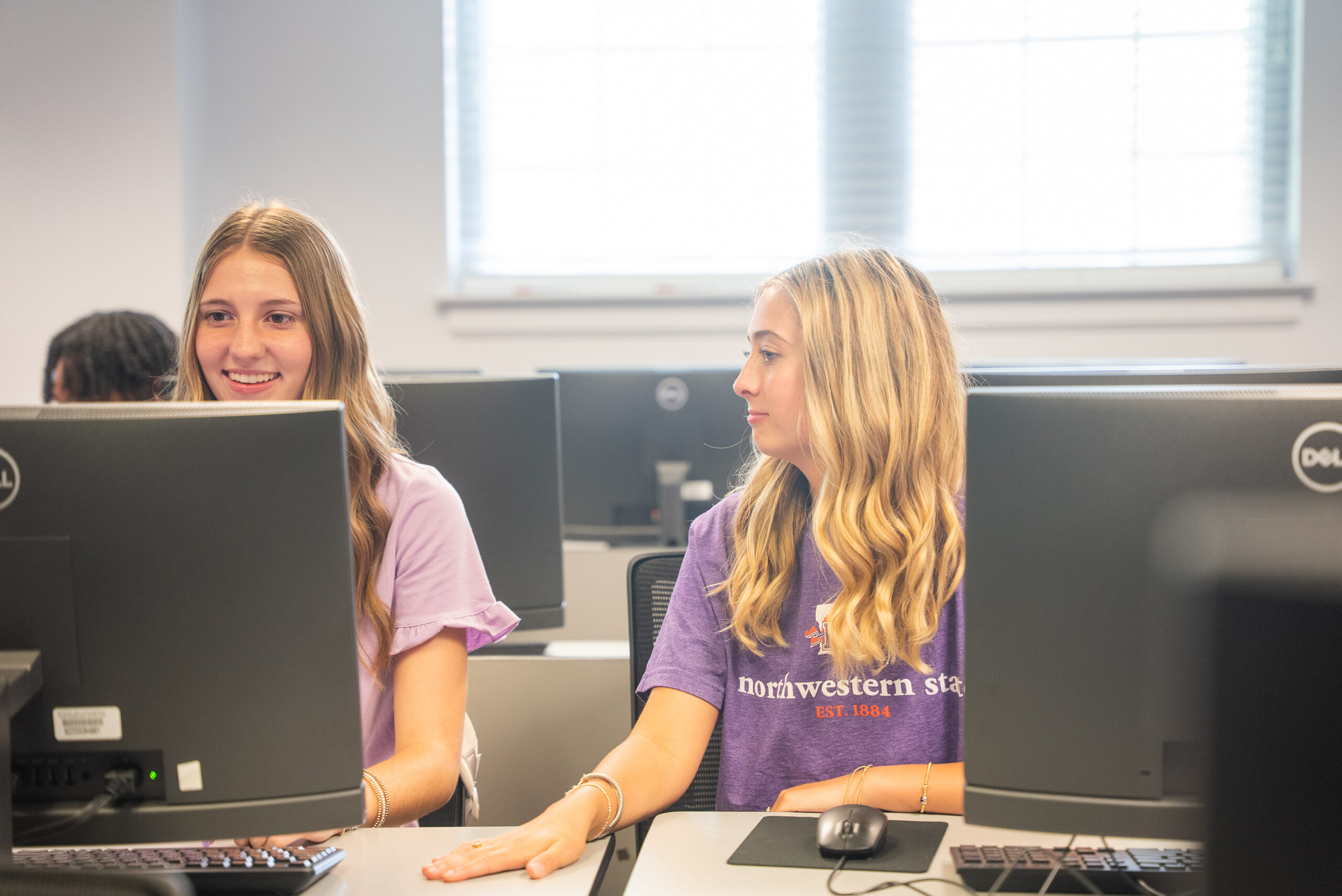 students studying on NSU's campus