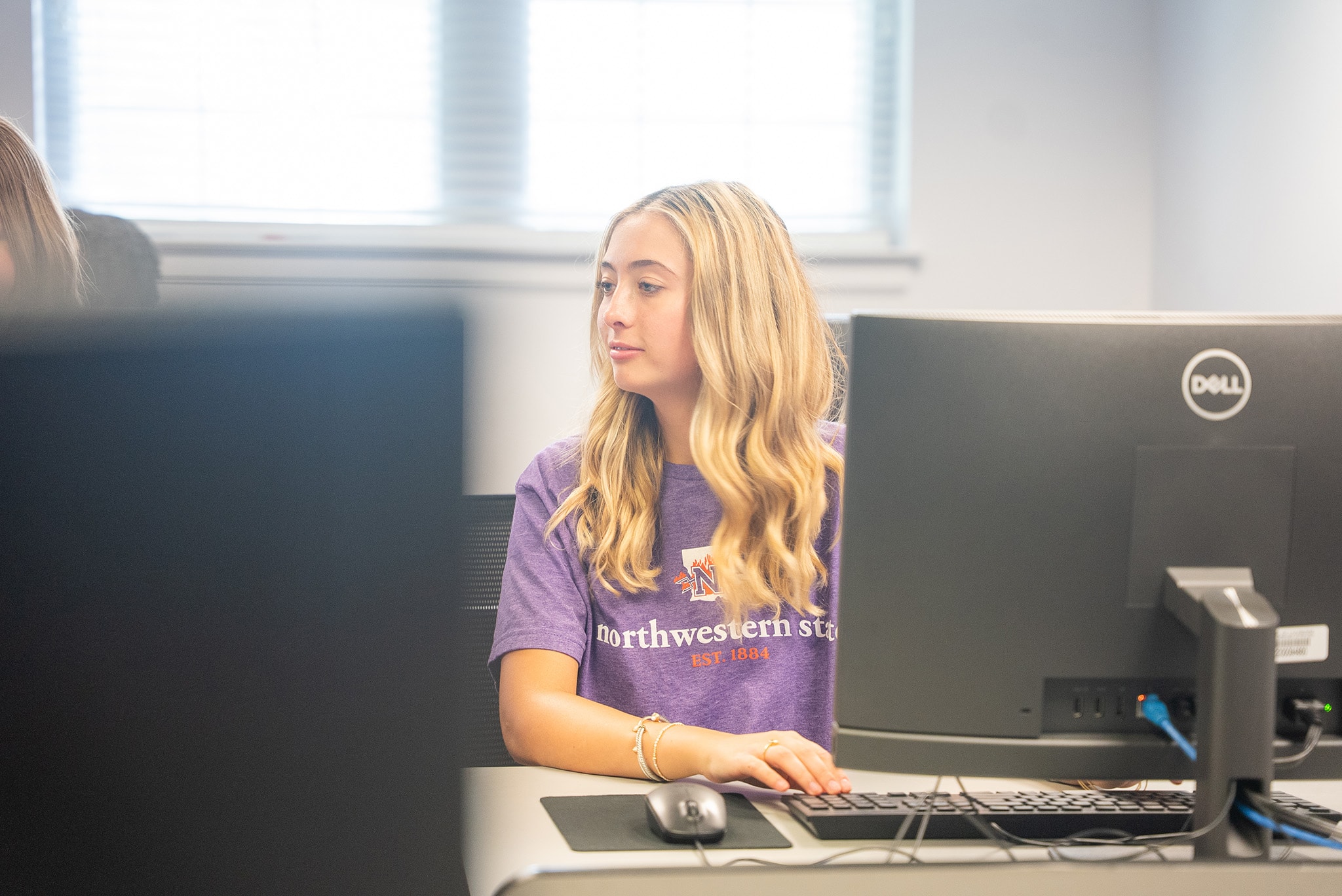 students studying on NSU's campus
