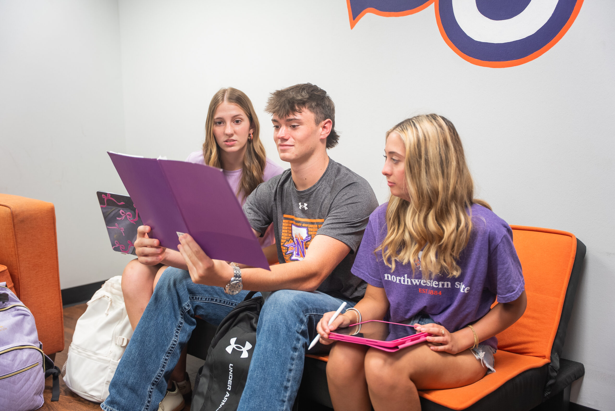students studying on NSU's campus