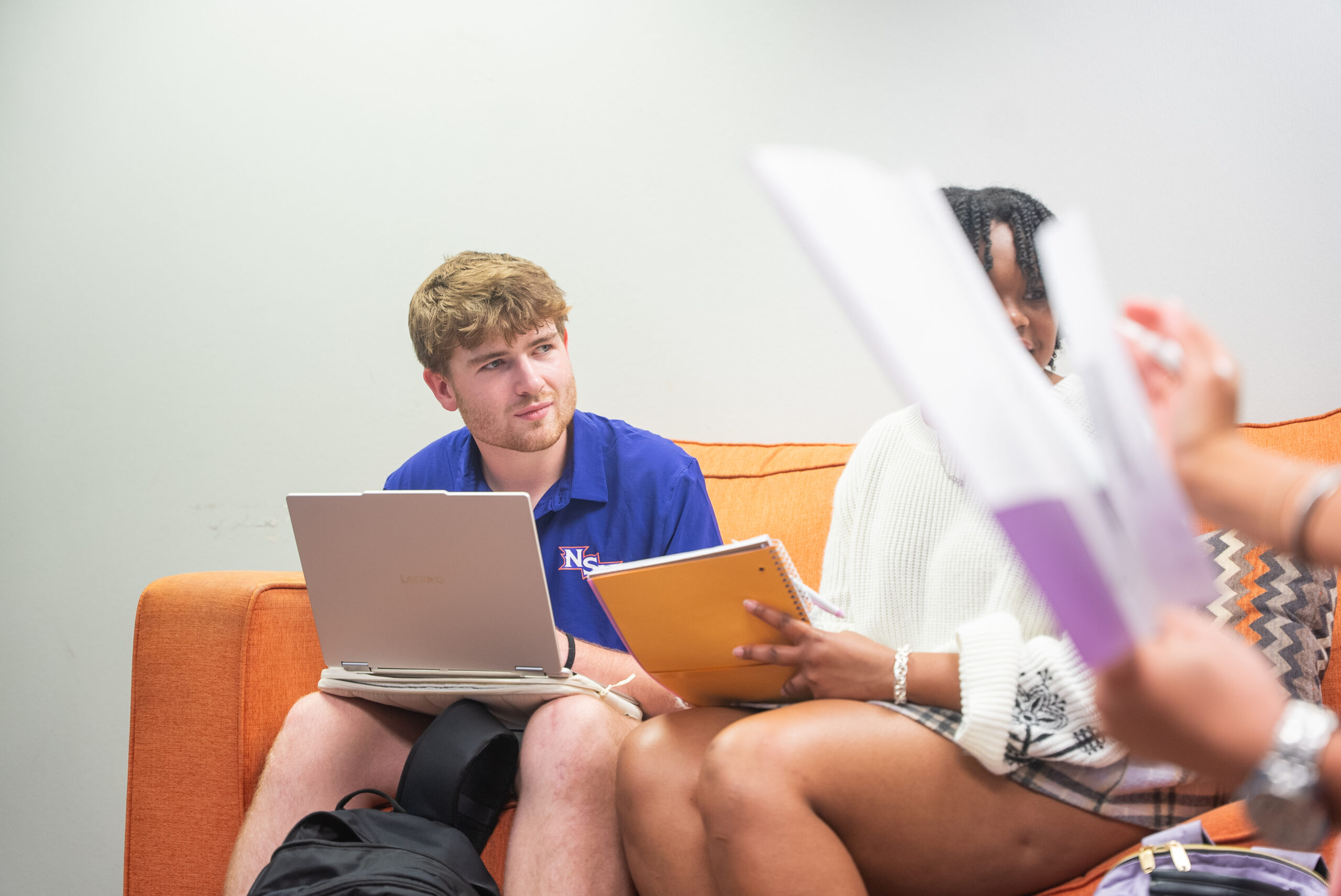 students studying on NSU's campus