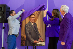 Artist and associate professor Edgar Cano Lopez, SGA President Madysen Morgan and NSU President James Genovese unveiled a portrait of Dr. Robert Alost as part of the SGA Portrait Project that ensures that buildings named after individuals feature a portrait of the person honored.
