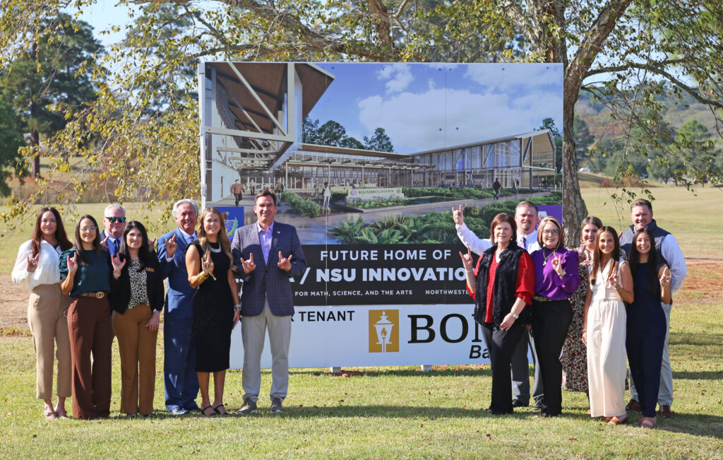 BOM Bank personnel joined NSU administrators to announce that the bank will be the anchor tenant for The CoLab to be located in the future Innovation Park. From left are Brandy Myers, BOM Bank senior vice president and chief human resources officer; Lyn Jones, BOM Bank senior vice president and chief retail banking officer; Tyler Murchison, BOM Bank executive vice president and chief lending officer; Kathy Myers, BOM Bank senior vice president - chief compliance officer and BSA officer/OFAC; NSU President James Genovese, Carrie Hough, BOM Bank chief marketing officer; Ken Hale, BOM Bank president and CEO; Laurie Morrow, NSU executive director of Economic Development and University Advancement; NSU CFO Rodney Wilson, NSU Associate Director of Innovation Jill Leo, NSU Associate Director of Corporate and Community Engagement Danielle Cobb, Abby Williams, BOM Bank marketing intern; Micah Murchison, BOM Bank Louisiana marketing manager, and Cole Gentry, NSU chief marketing officer.