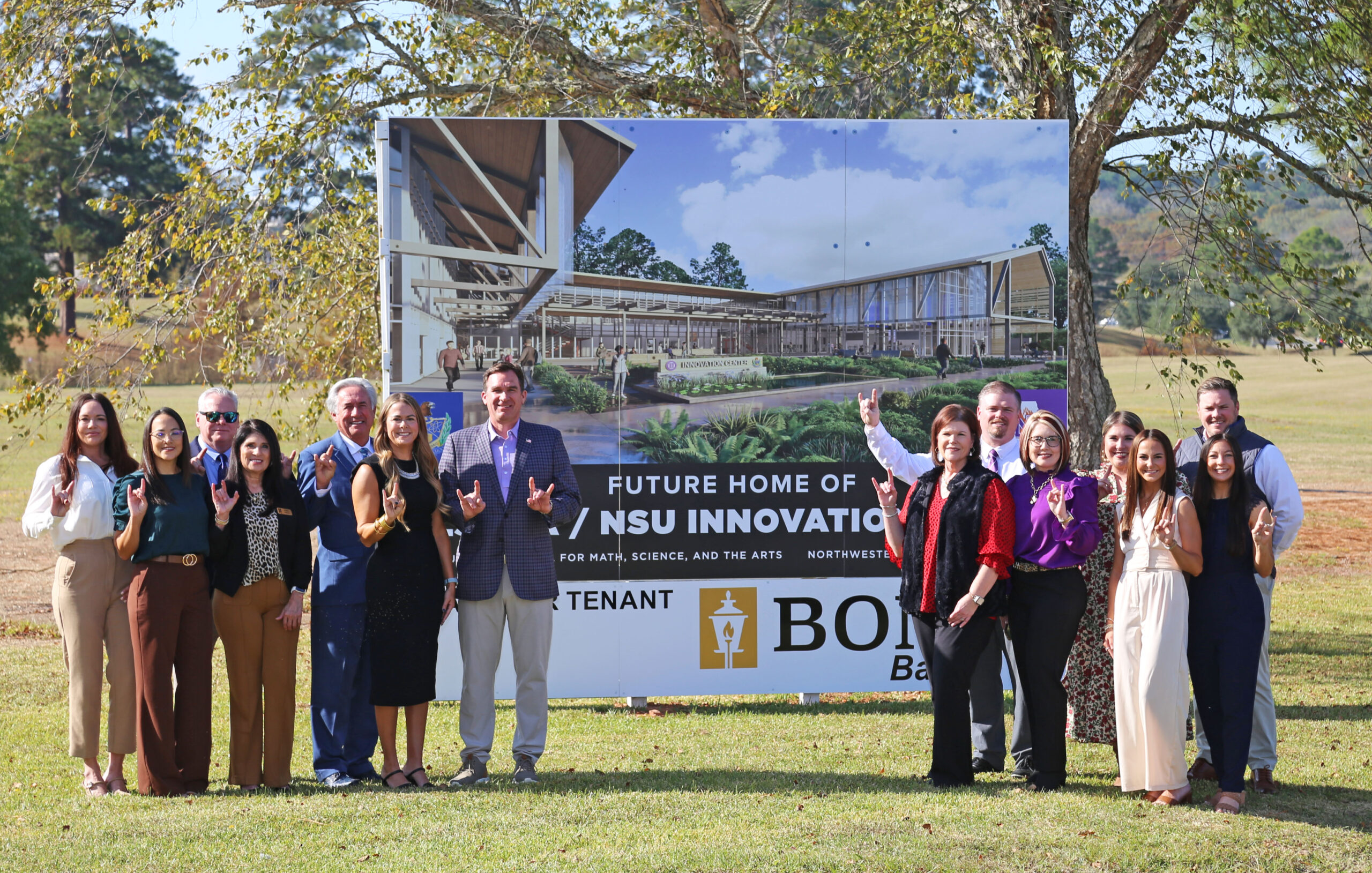 BOM Bank personnel joined NSU administrators to announce that the bank will be the anchor tenant for The CoLab to be located in the future Innovation Park. From left are Brandy Myers, BOM Bank senior vice president and chief human resources officer; Lyn Jones, BOM Bank senior vice president and chief retail banking officer; Tyler Murchison, BOM Bank executive vice president and chief lending officer; Kathy Myers, BOM Bank senior vice president - chief compliance officer and BSA officer/OFAC; NSU President James Genovese, Carrie Hough, BOM Bank chief marketing officer; Ken Hale, BOM Bank president and CEO; Laurie Morrow, NSU executive director of Economic Development and University Advancement; NSU CFO Rodney Wilson, NSU Associate Director of Innovation Jill Leo, NSU Associate Director of Corporate and Community Engagement Danielle Cobb, Abby Williams, BOM Bank marketing intern; Micah Murchison, BOM Bank Louisiana marketing manager, and Cole Gentry, NSU chief marketing officer.