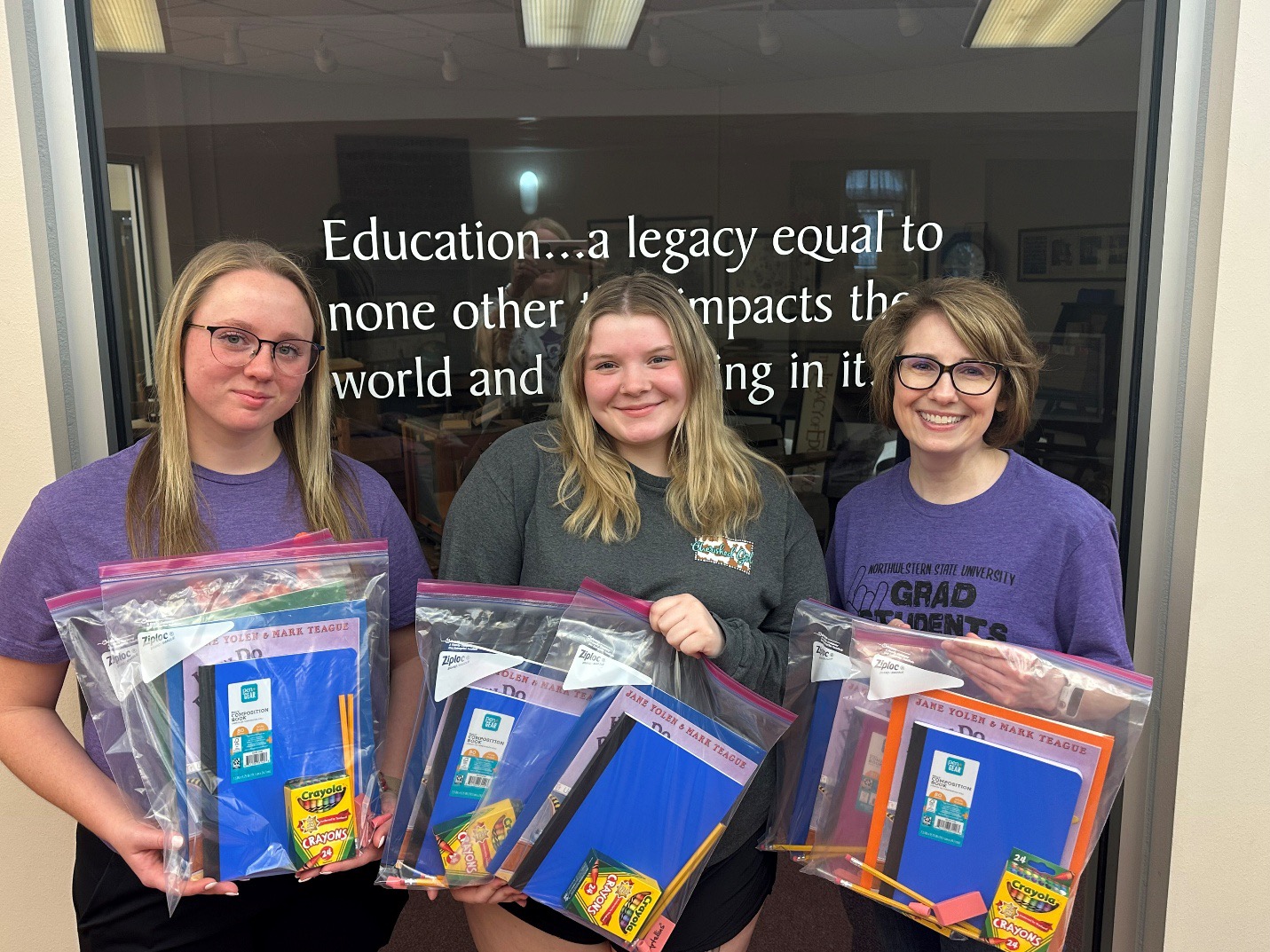 Pictured from left are NSU Early Childhood Education Majors Taylor Poole and Serenity White, both of Pollock, and Dr. Michelle Fazio Brunson.