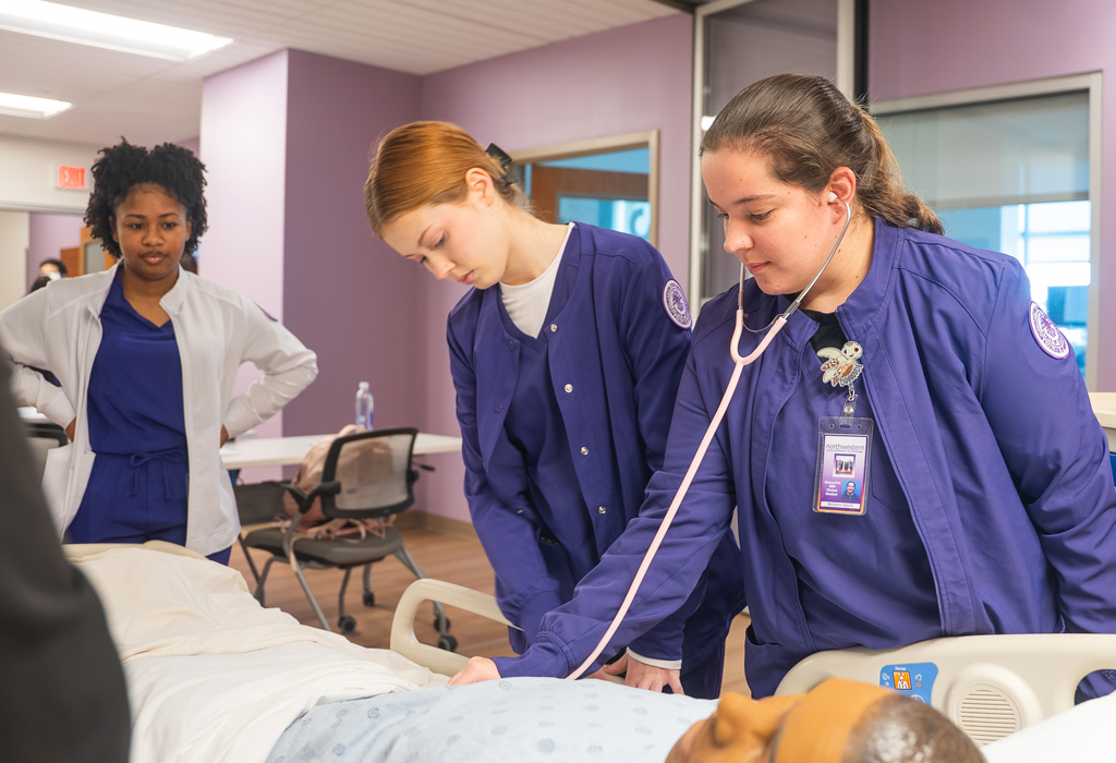 NSU Nursing students perform hands-on learning in simulation lab in Christus Cabrini.