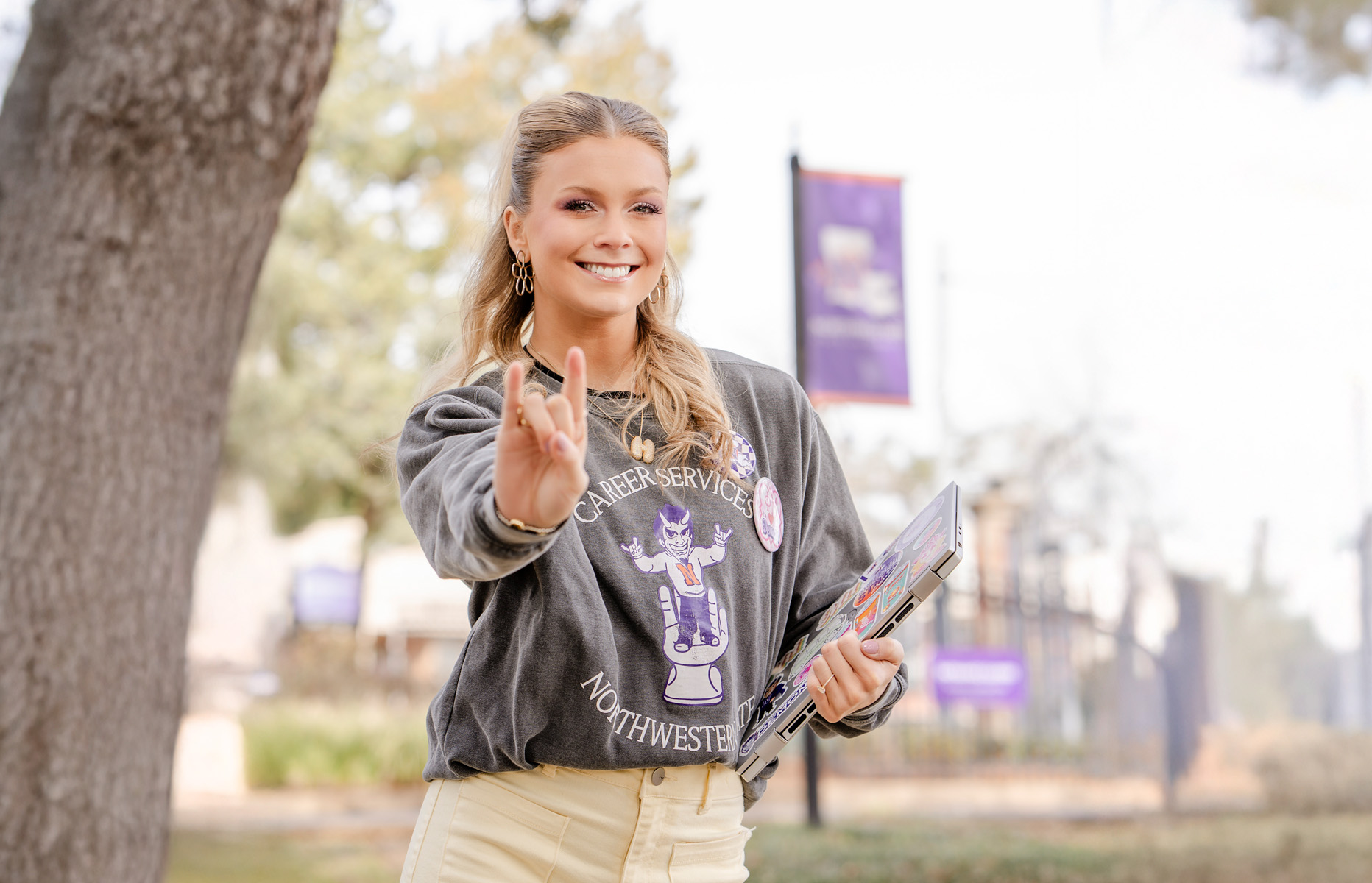 NSU Student Honor Camus at Front Gates of Northwestern State University