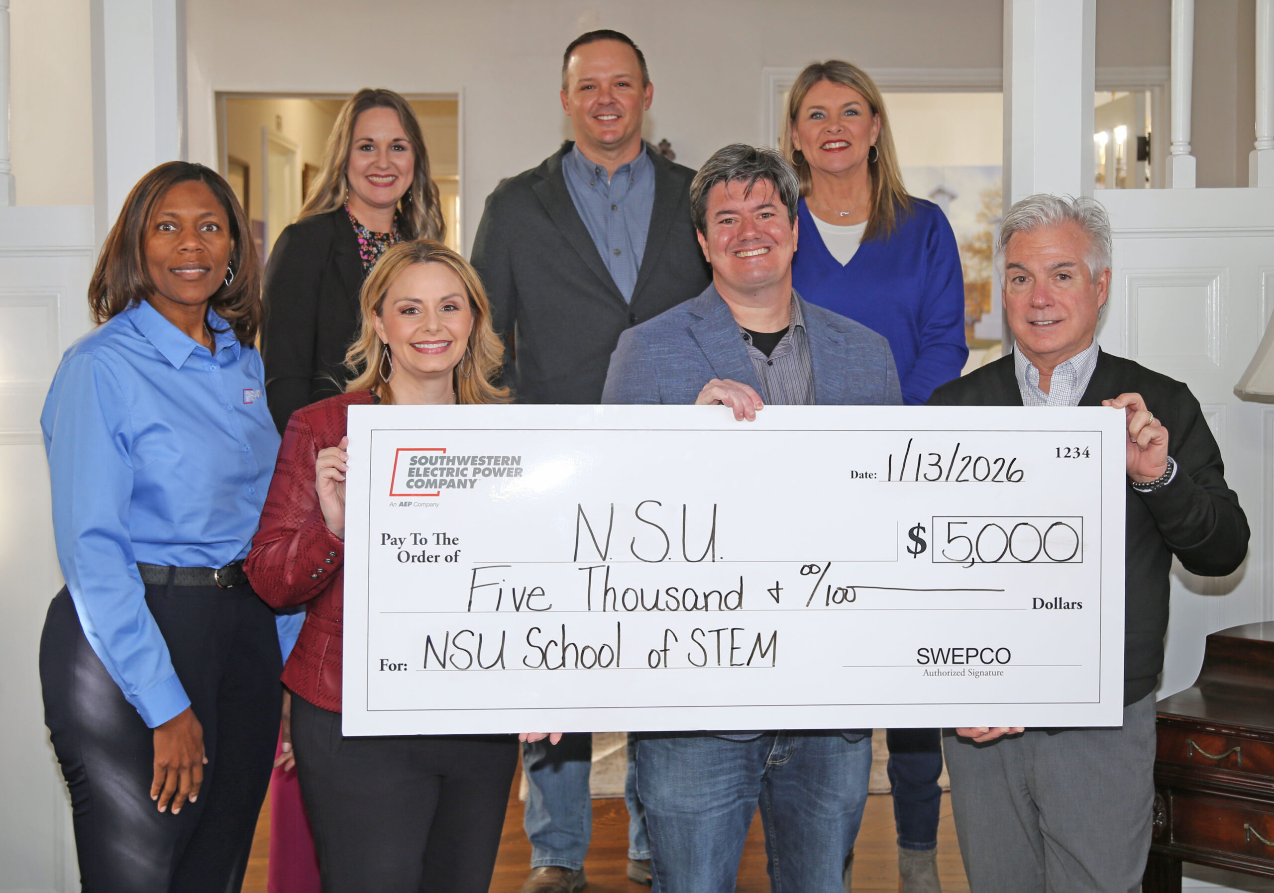 SWEPCO donated $5,000 to NSU’s School of STEM to support upcoming outreach initiatives. On the front row from left are SWEPCO Communications Representatives Shantell Jordan and Brooke Rinaudo, Dr. Christopher Lyles, director of NSU’s School of STEM, and Michael D Corbin, AEP/SWEPCO External Affairs manager. On the back row are Gwen Fontenot, NSU’s director of Corporate and Community Engagement; Chris Janz, manager of Distribution Services, Valley District, and Belinda Berry, customer service account representative, Valley District.