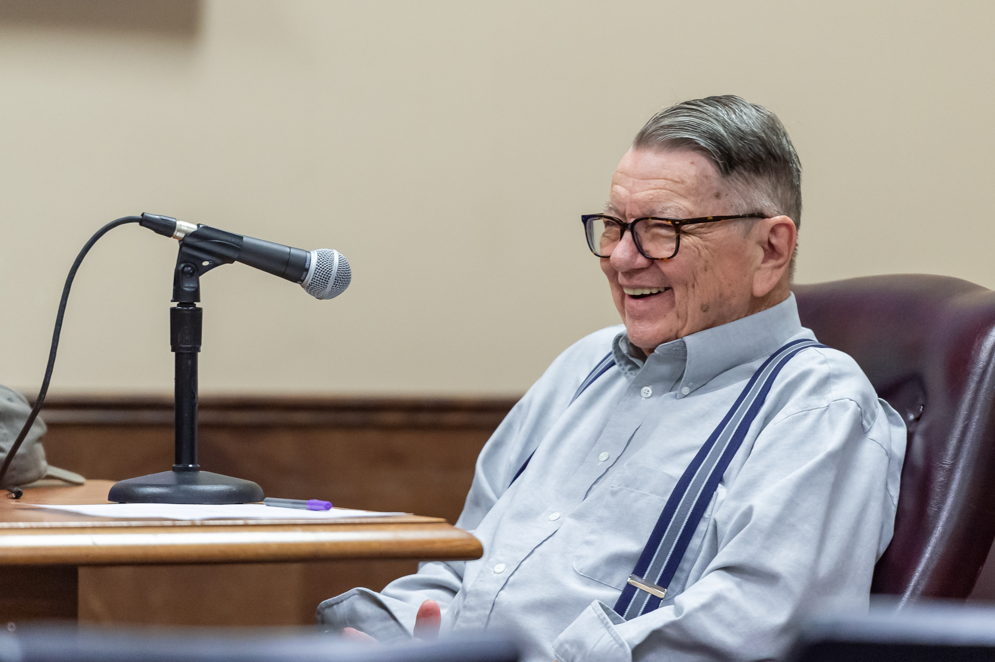 People speaking at the Louisiana Studies Conference into a microphone