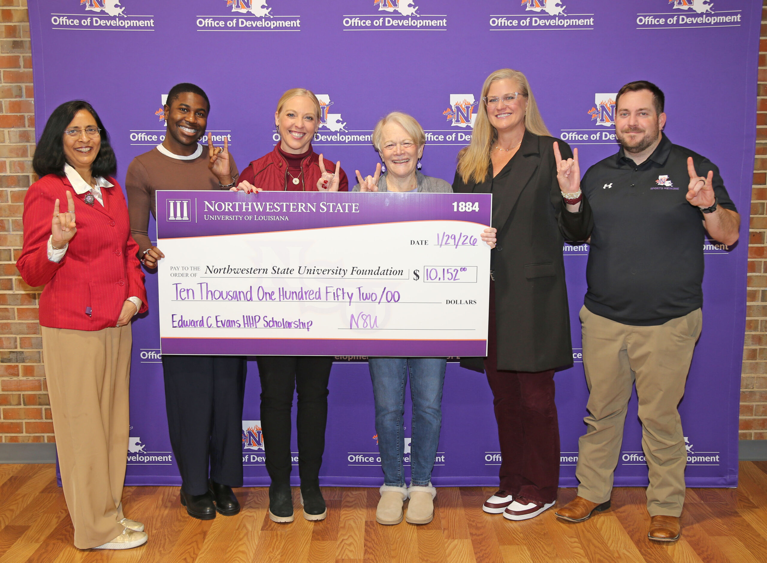 The Edward C. Evans Health and Human Performance Scholarship has been endowed at the $10,000 level with administrators striving to reach $20,000 to benefit students in the HHP Department. From left are Dr. Neeru Deep, dean of the College of Education and Human Development; Terry Wilson, assistant director of Donor Relations for the NSU Foundation; Dr. Haley Blount, assistant professor in HHP; Chris Evans, wife of Ed Evans; HHP Department Head Dr. Tara Tietjen-Smith and Kal Pajuluoma, director of Sports Medicine and head football athletic trainer.