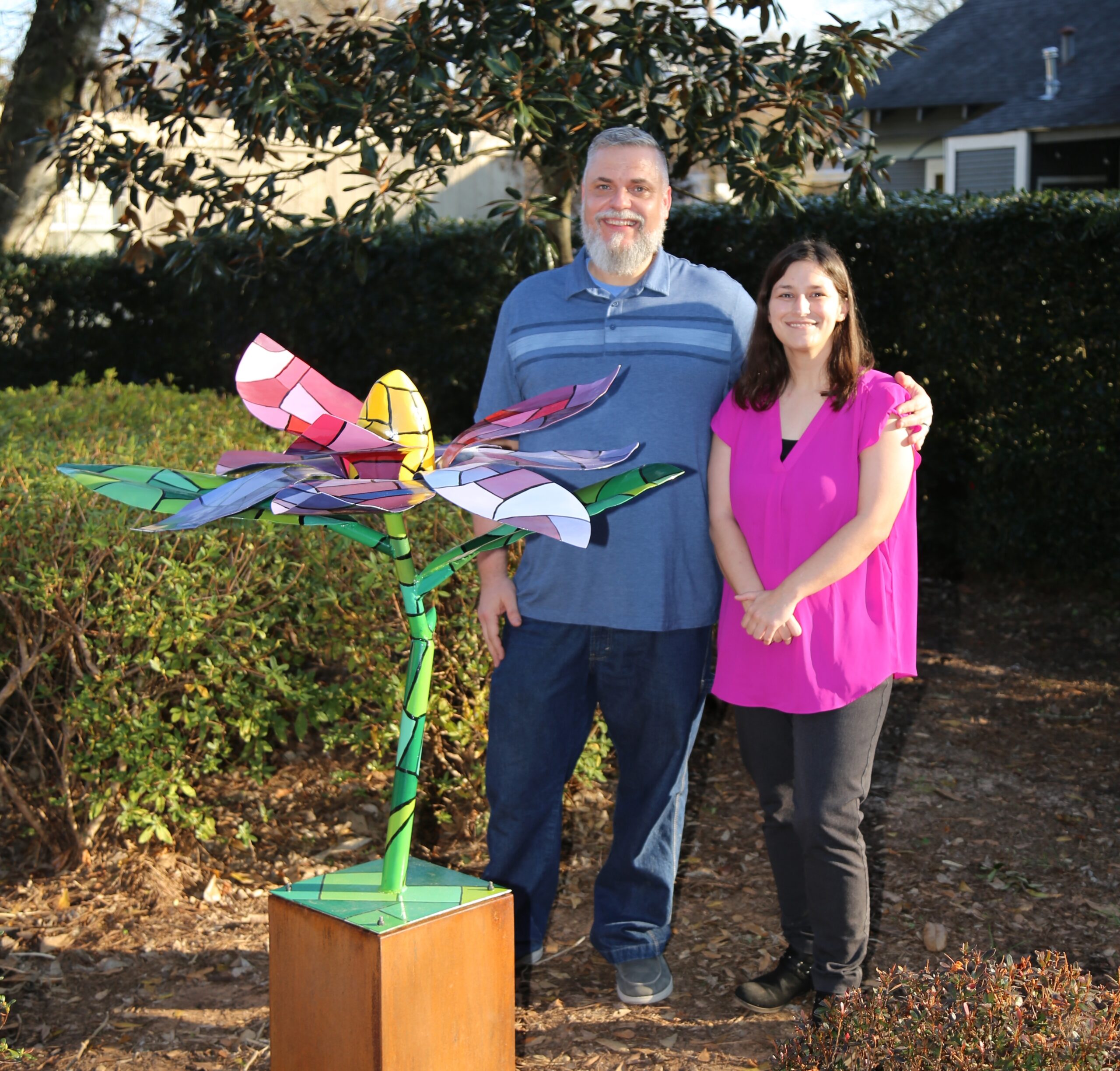 NSU Professor of Art Corbin Covher and Hannah Fulton, assistant professor of art at LCU and NSU alum, unveiled the latest Natchitoches in Bloom sculpture, a painted magnolia placed in the Susan Harling Robinson Memorial Park, a pocket park at the corner of Pine and Cypress streets in the Natchitoches Historic District.