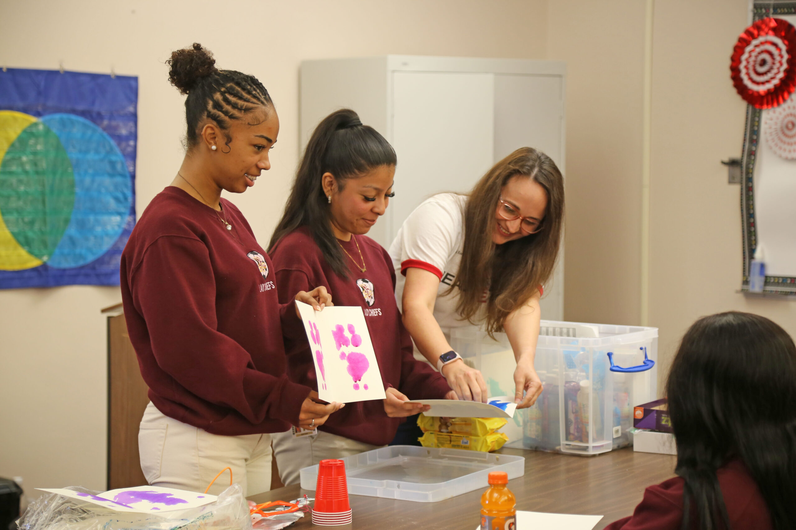 Natchitoches Central students Jayna Curry and Ashley Hernandez created Rorschach tests in an activity led by Beverly Broadway, NSU instructor of psychology, during a Healthcare Academic & Career Exploration (ACE) event Feb. 27. The Rorschach test is a projective psychological test that can be used to interpret personality characteristic and emotional functioning.