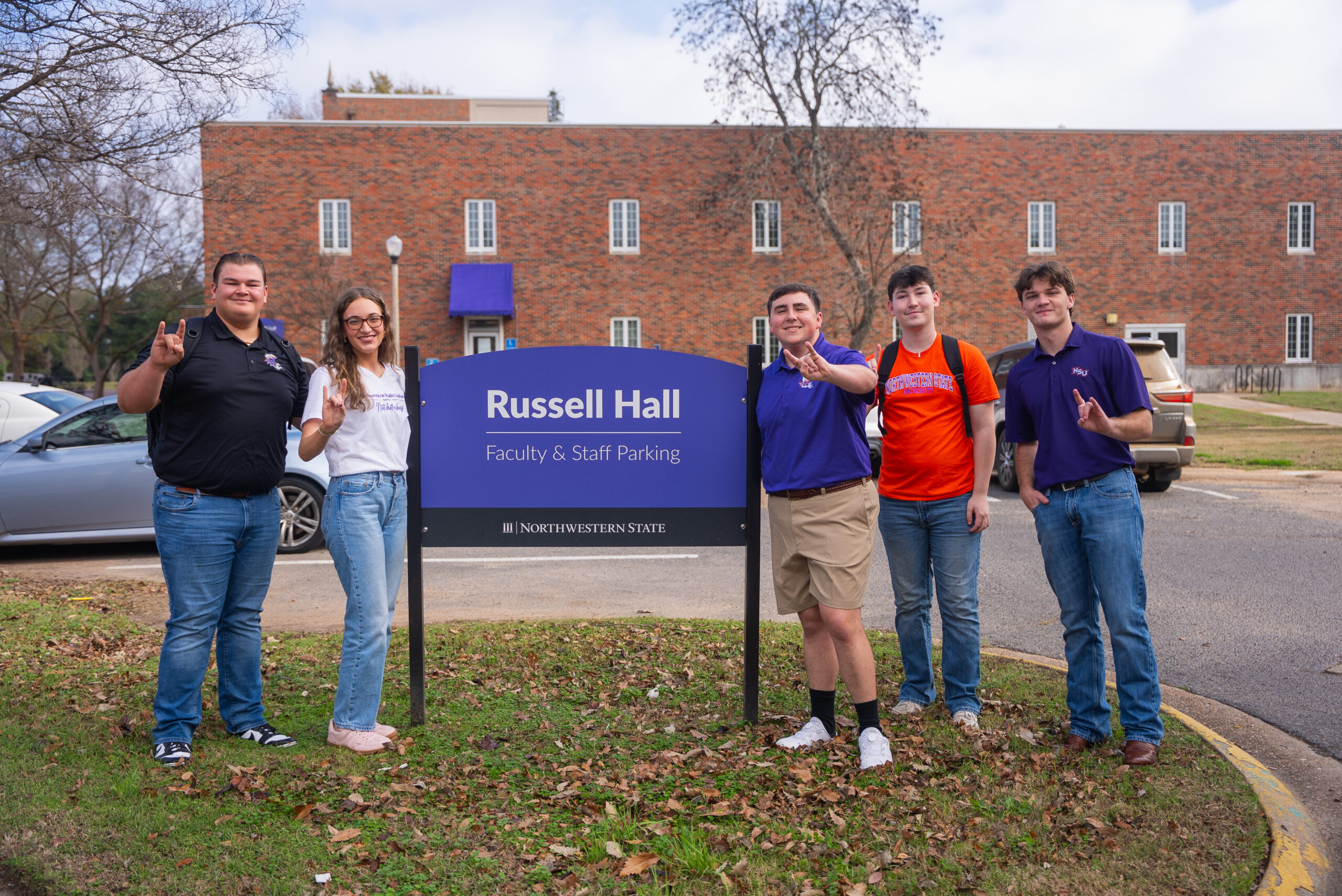 students standing in front of Russell Hall