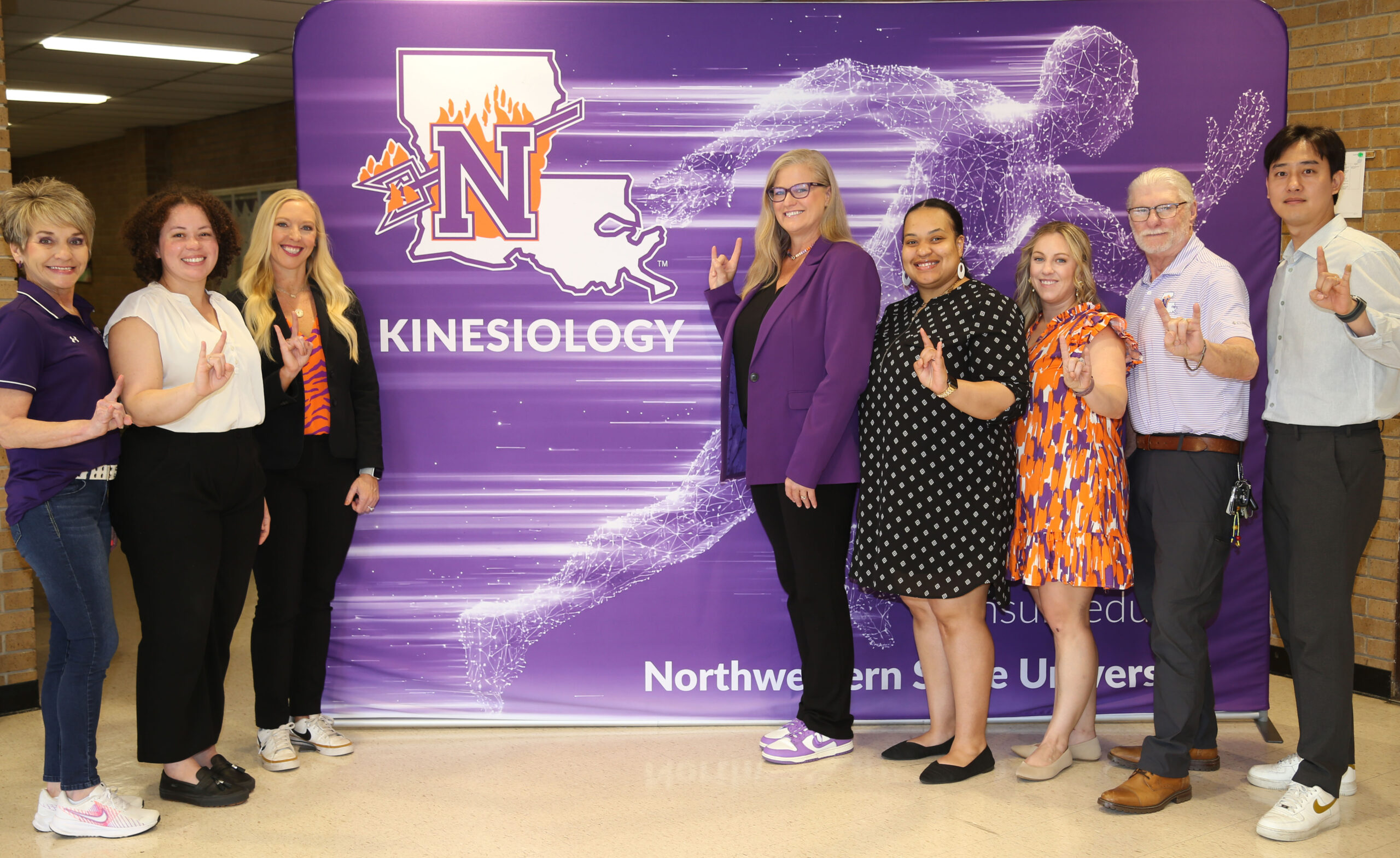 NSU’s former Department of Health and Human Performance is undergoing a rebrand and will be known as the School of Kinesiology. From left are School of Kinesiology staff and faculty Tammy Dobson, Dr. Jackie Calhoun, Dr. Haley Blount, School Director Dr. Tara Tietjen-Smith, Maya Lucas, Dr. Lauren Mitchell, Dr. Michael Moulton and Dr. Sunggun Jeon.