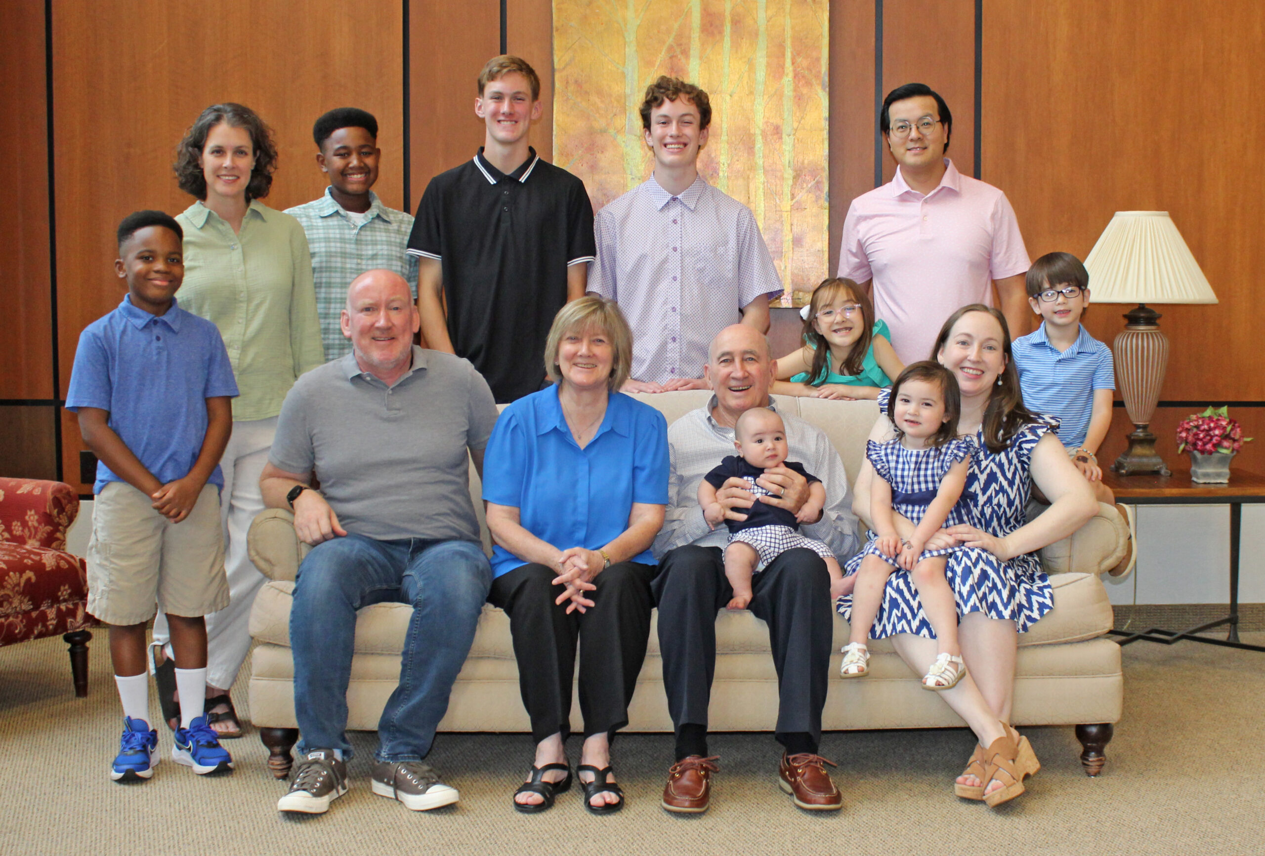 The Strange family are, seated from left, Micah Strange, Susan and Dan Strange, Grant Nguyen, Camille Nguyen and Jessica Strange Nguyen. Standing are Joshua, Jennifer, Calvin, Isaac and Noel Strange and Madeleine, Thang (T) and Everett Nguyen.