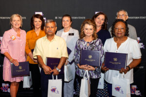 Recognized for 25 years of service to NSU were, from left, Melissa Aldredge, Charlotte Grayson, Rafiqul Islam, Leslie Gruesbeck, Tammy Curtis, Becky Farmer, Frances Welch and Alexei Muravitsky.