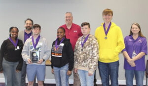 The team from Saline High School won second place in Team competition. From left are Latreasure Jackson, Zeb Marcotte, head of NSU’s Mathematics Department; Jackson Bougues, Brooklyn Page-Loyd, Jim Cole from Sabine State Bank, Bentley Branch, Braydon Robinson and Debbie Porter, director of the Demon Mathematics Classic.