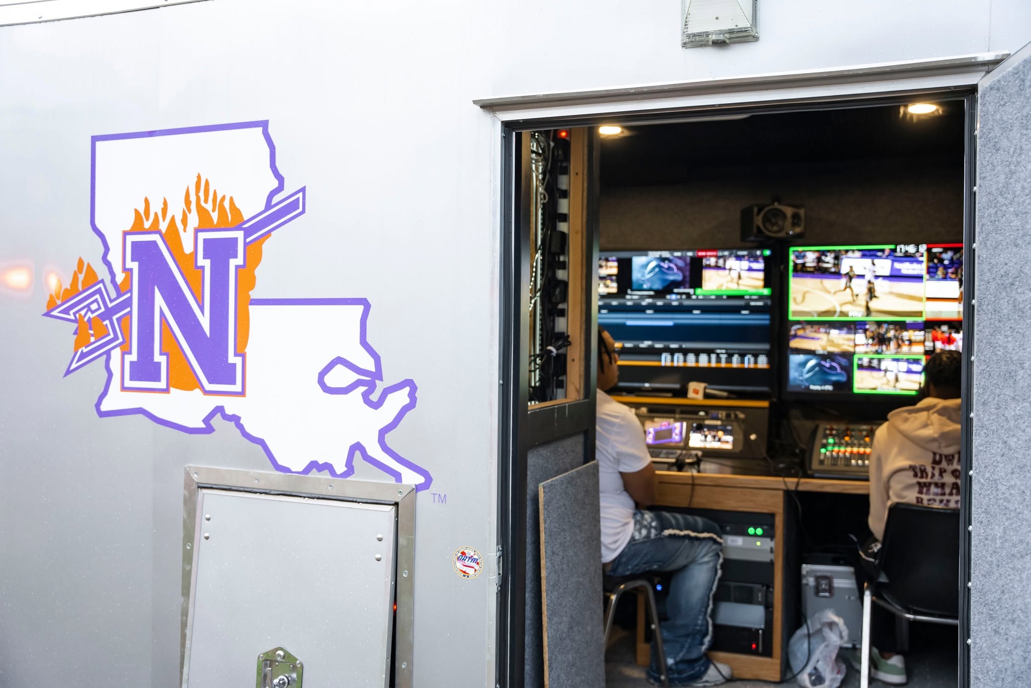 ESPN+ trailer with NSU logo on the side of it
