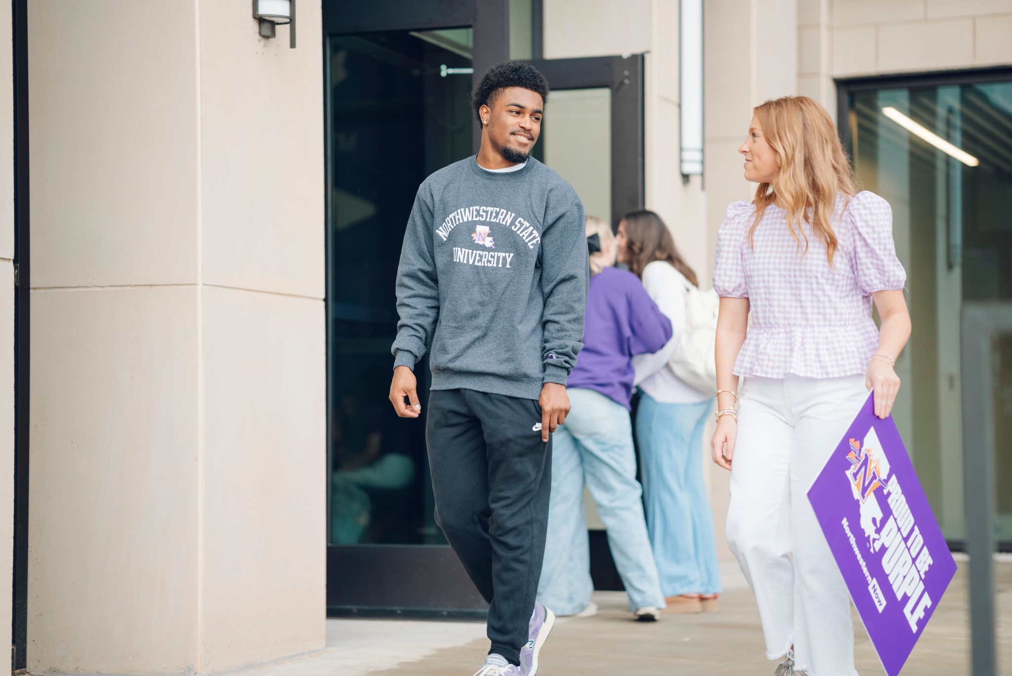 two NSU students walking on campus