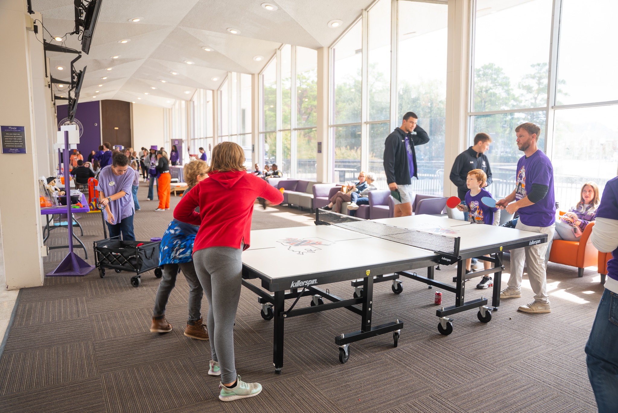 Students playing ping pong in the student union