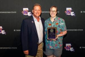 Dr. Allison Rittmayer, right, was honored for Excellence in Academic Advising. The award was presented by Steve Hicks, executive director of Academic Engagement and Student Success.