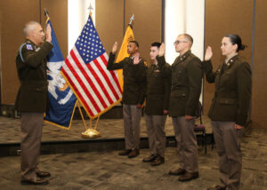 LTC Joshua Drake administered the U.S. Army oath of office to graduating NSU ROTC cadets Christian Holmes, Ethan Jones, Lawson Turner and Layla Wood during a commissioning ceremony for family and friends.