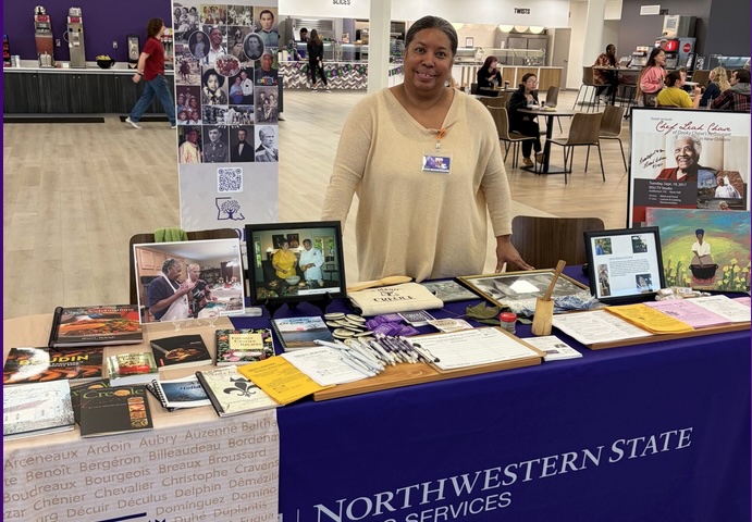 Kelly Jackson represents the Creole Heritage Center in sharing information about the CHC.