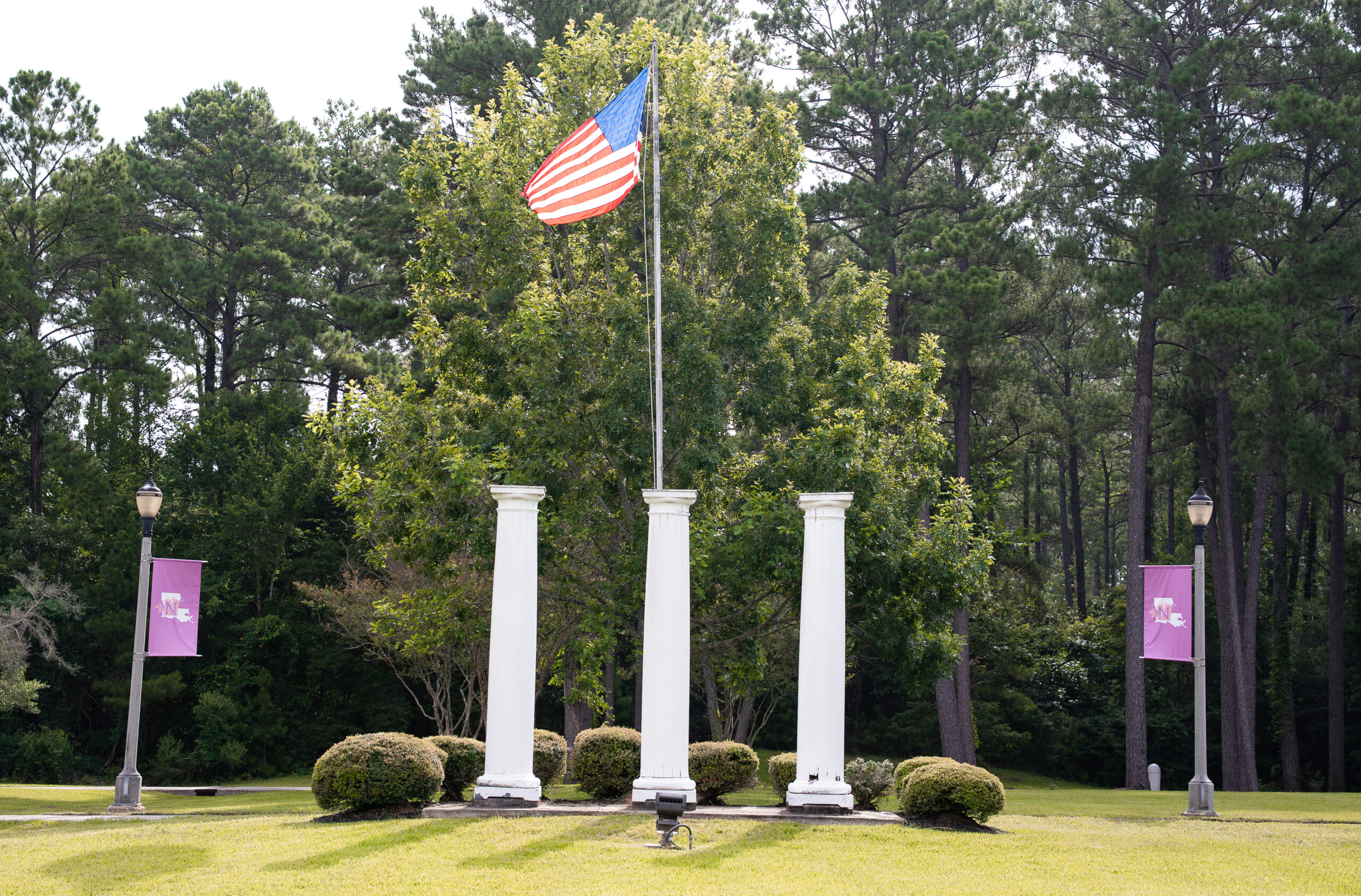 The American flag flies over the courtyard at NSU-Leesville/Fort Polk.