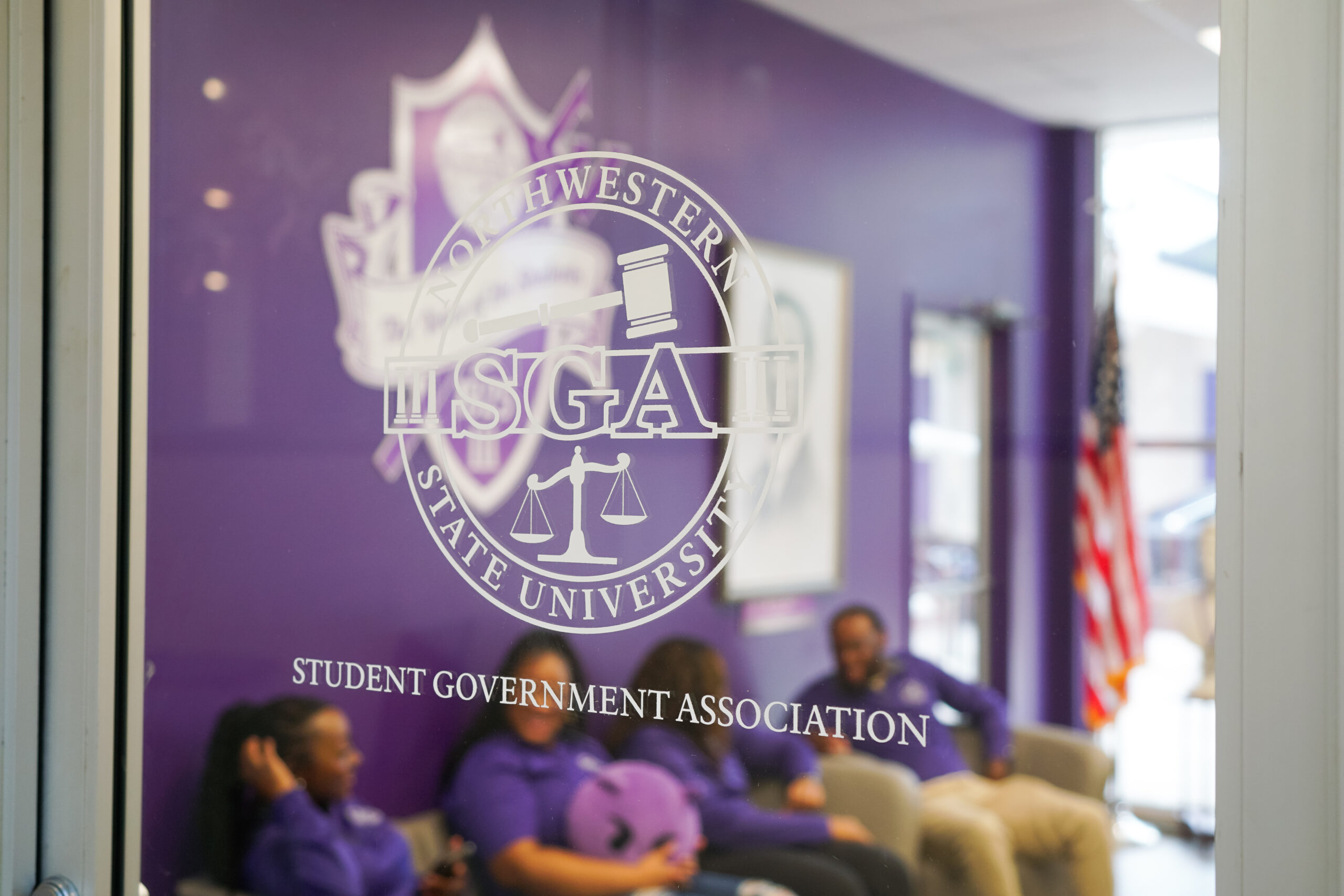 students sitting in the SGA office