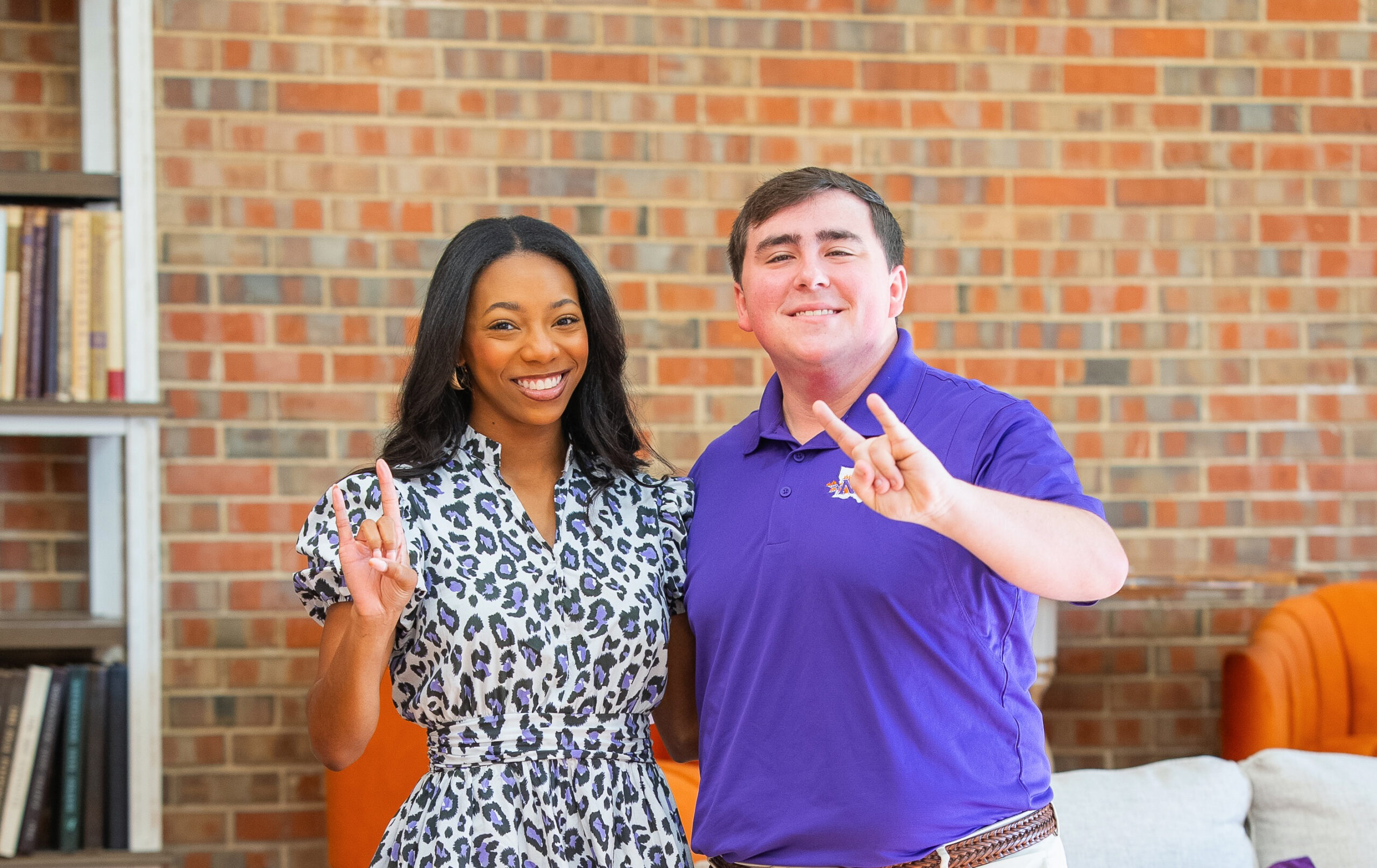 Lauryn Vernon, left, and Owen Stutzman pose in Northwestern State University’s new Alumni Center.