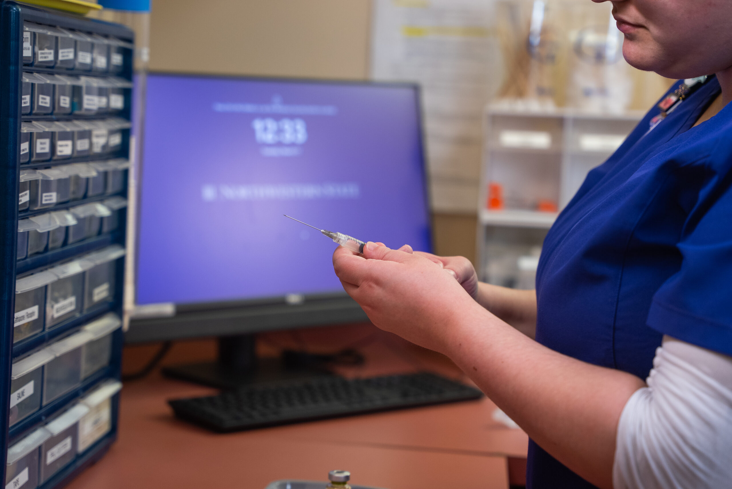nursing student working in med pass lab
