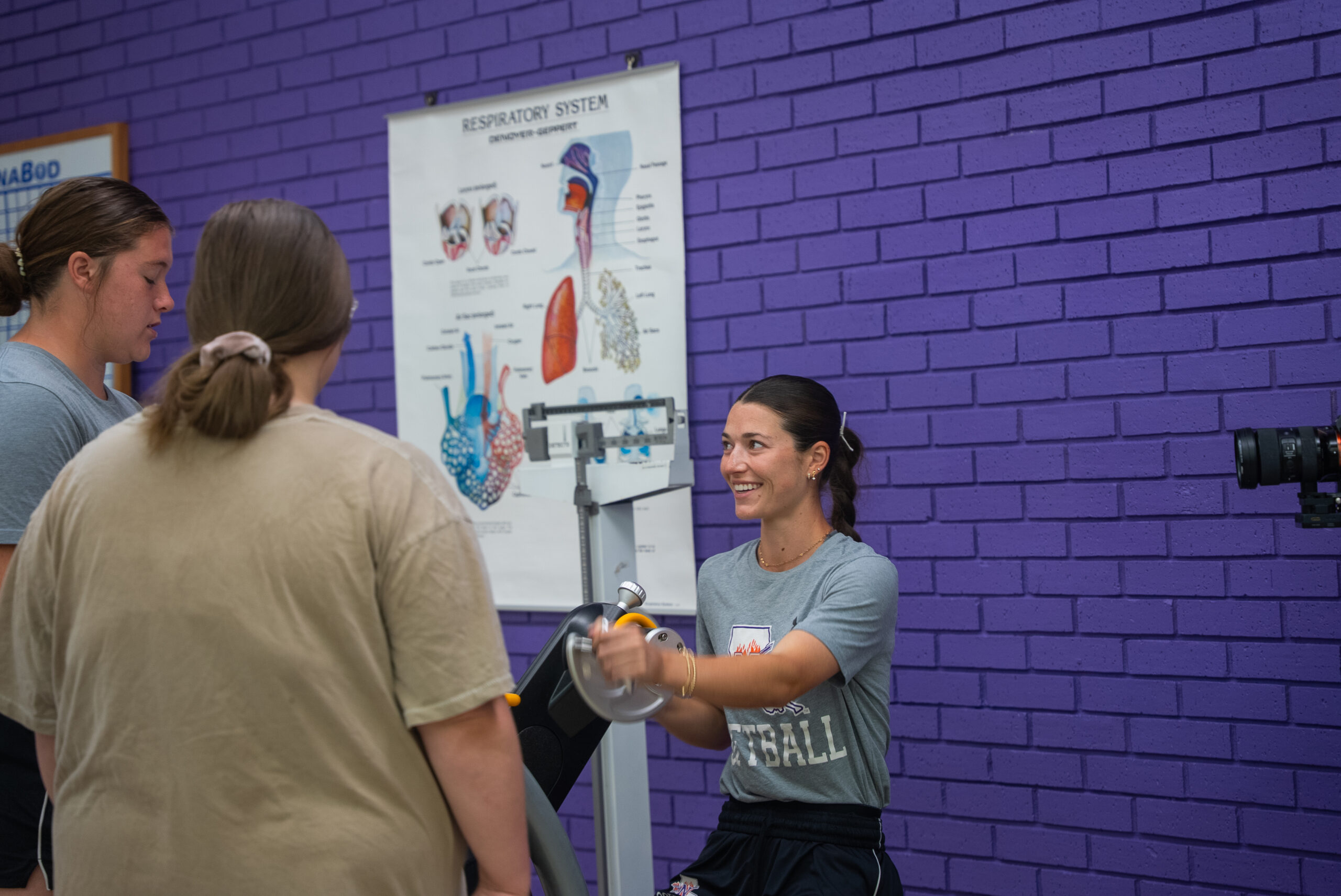 student in a workout room working on vitals