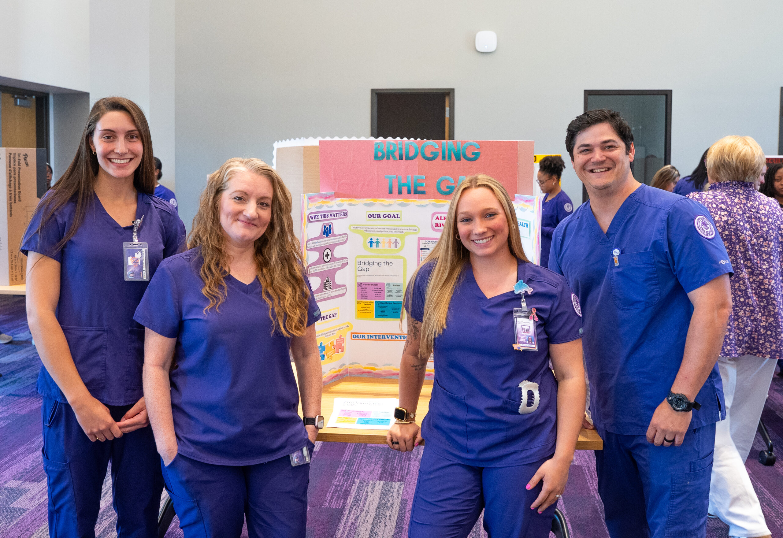 Senior Bachelor of Science in Nursing students present their community impact project focused on homelessness during Level 5 presentations at Northwestern State University's Cenla campus. Pictured, from left, are Dana Atwood, Jesci Lord, Alyson Tarver and Ian David.
