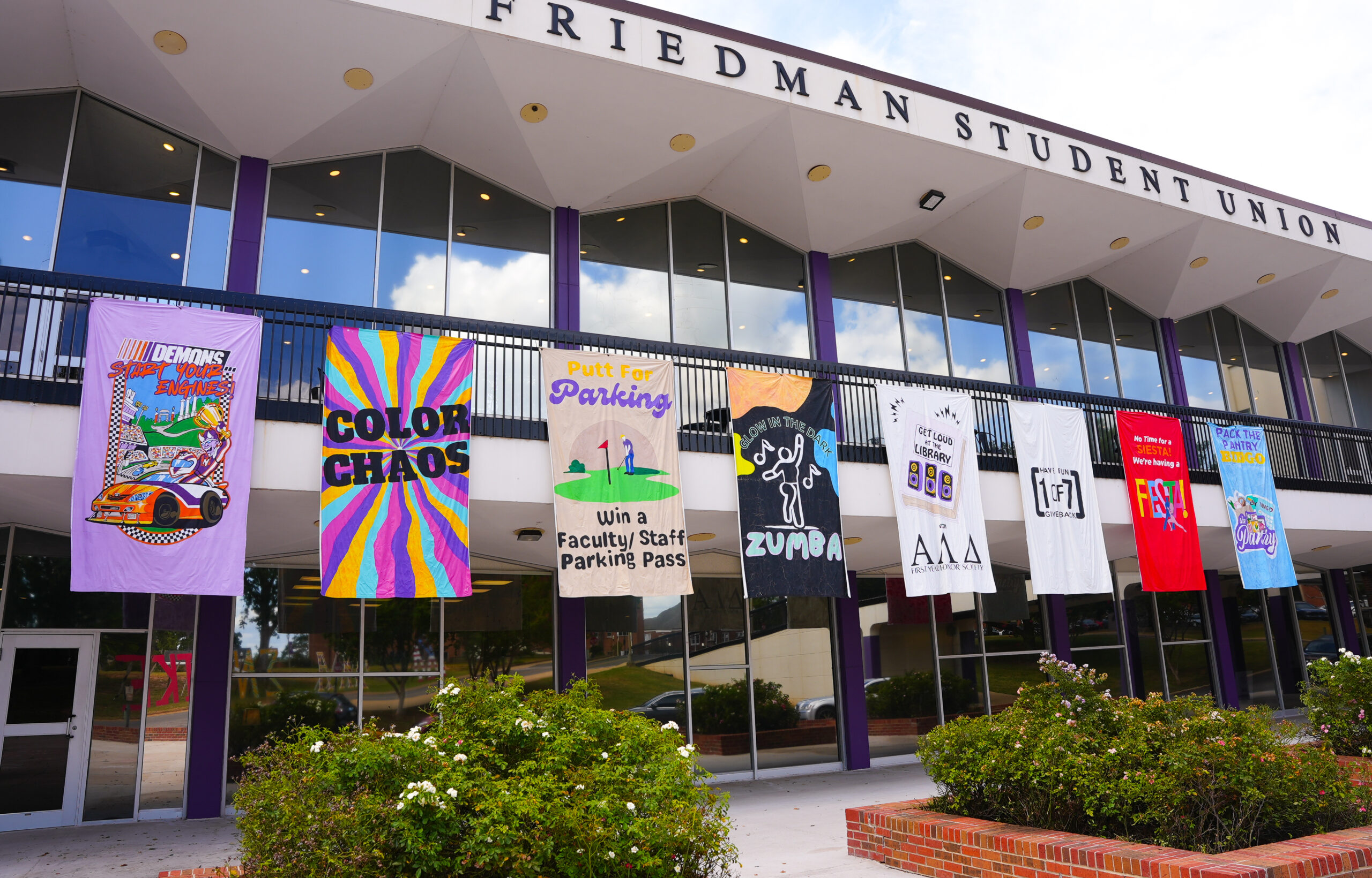Banners highlighting Demon Days traditions hang outside the Friedman Student Union during the first week of classes at Northwestern State University.