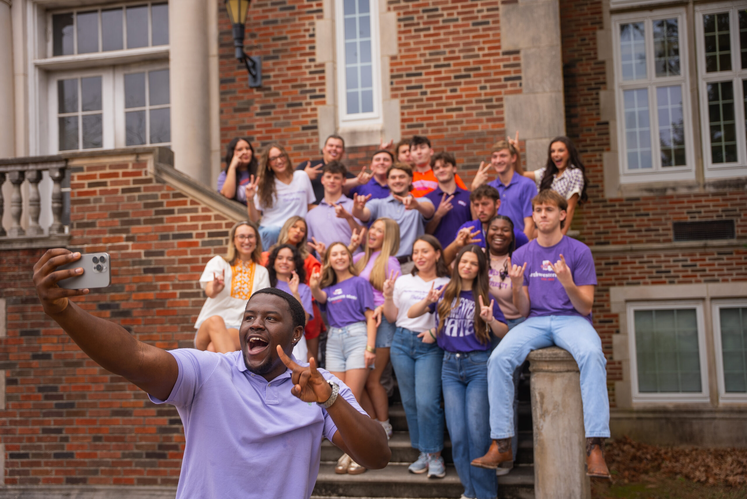 large group of NSU students taking a selfie