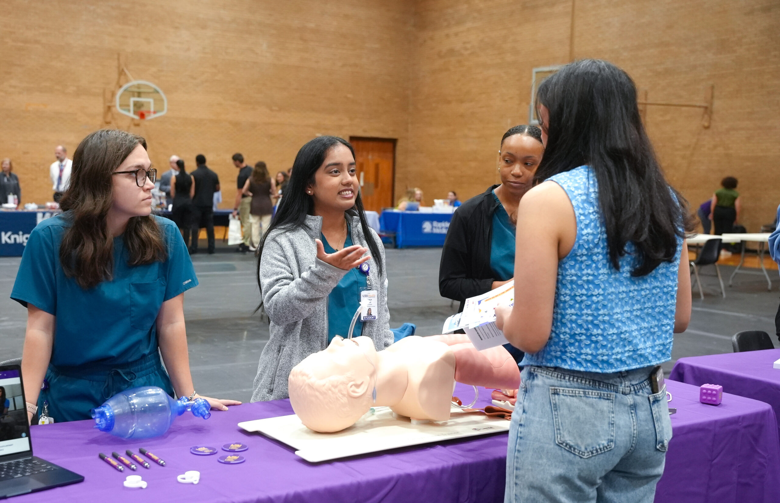 NSU student Jenna Marler speaks with Shreya Patel and other LSU Health cardiopulmonary science students during Career Day on Oct. 26.