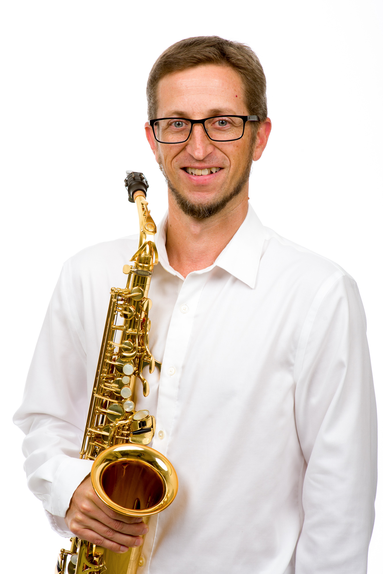 Paul Forsyth holding an instrument