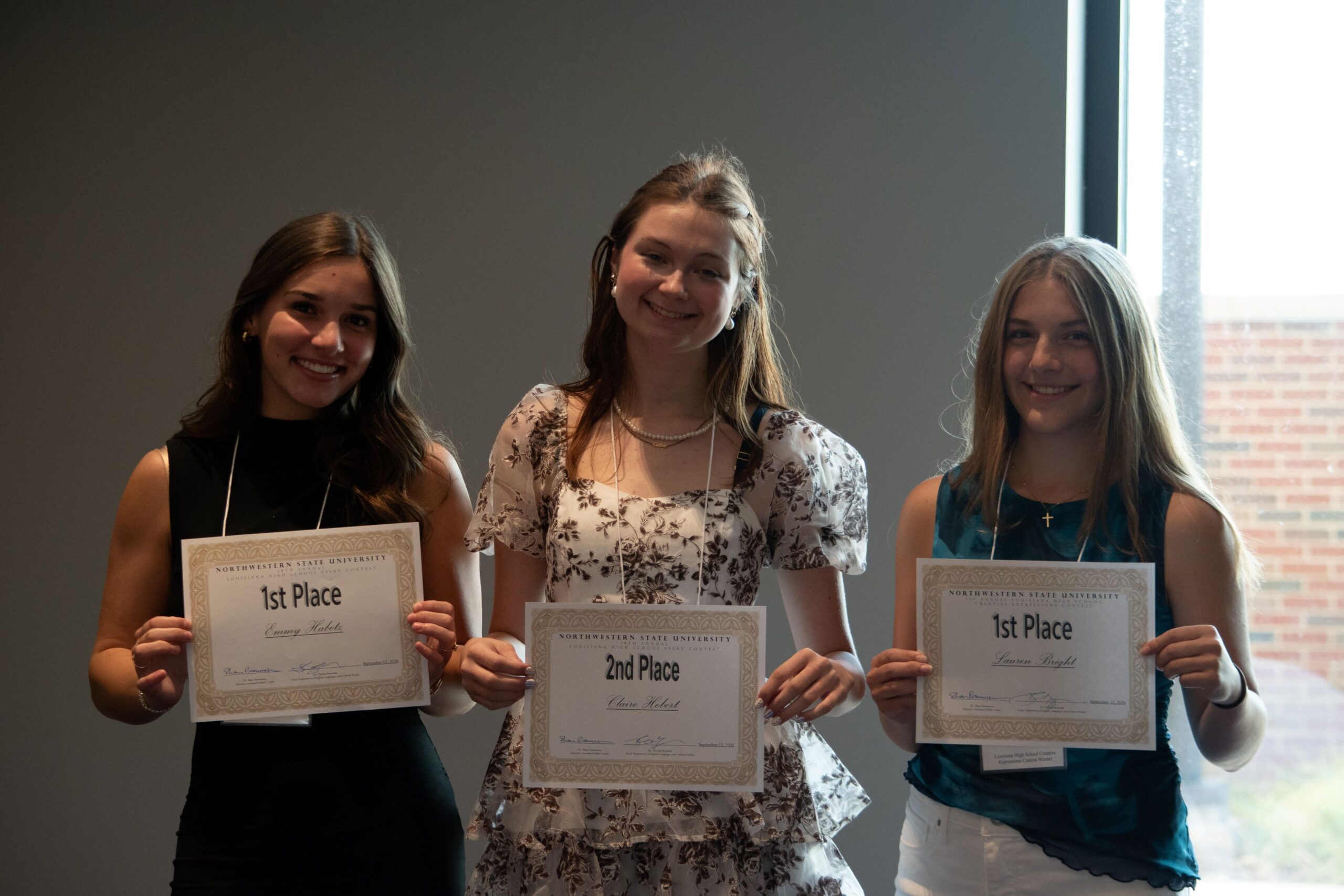Winners of the 2026 NSU Louisiana High School Essay and Creative Visions Contests were announced at the annual Louisiana Studies Conference. Essay contest winner Emmy Habetz, far left, is with essay contest runner up Claire Hebert, center, and Creative Visions Contest winner Lauren Bright. Photo by Cecelia Flanders