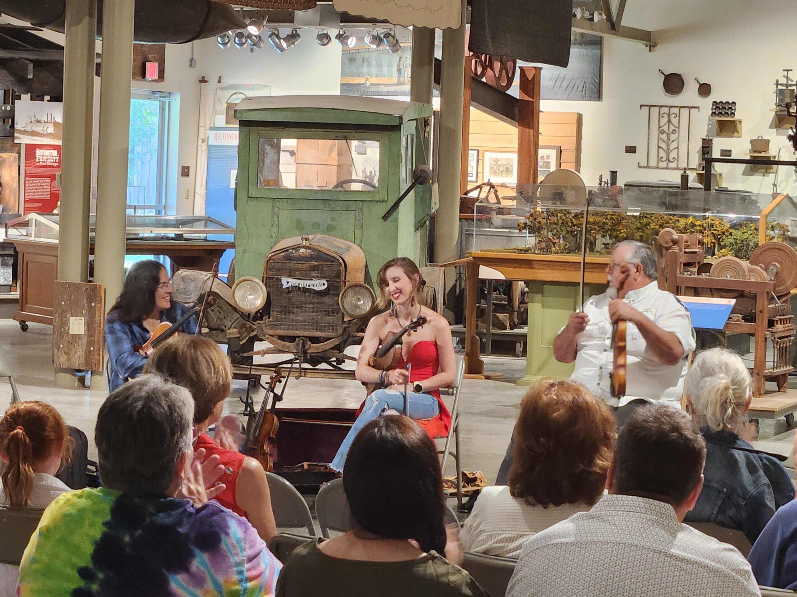 Fiddlers, from left, Gina Forsyth, Clancey Stewart and Joe Suchanek at the “Fiddlin’ with the Finest! A Celebration of Louisiana Folk Fiddling” program held Saturday at the LSU Rural Life Museum in Baton Rouge. The program was sponsored by the Louisiana Folklife Center at Northwestern State University to promote the annual Louisiana State Fiddle Championship which will be held in Natchitoches on July 18. Photo by Christina Brown.