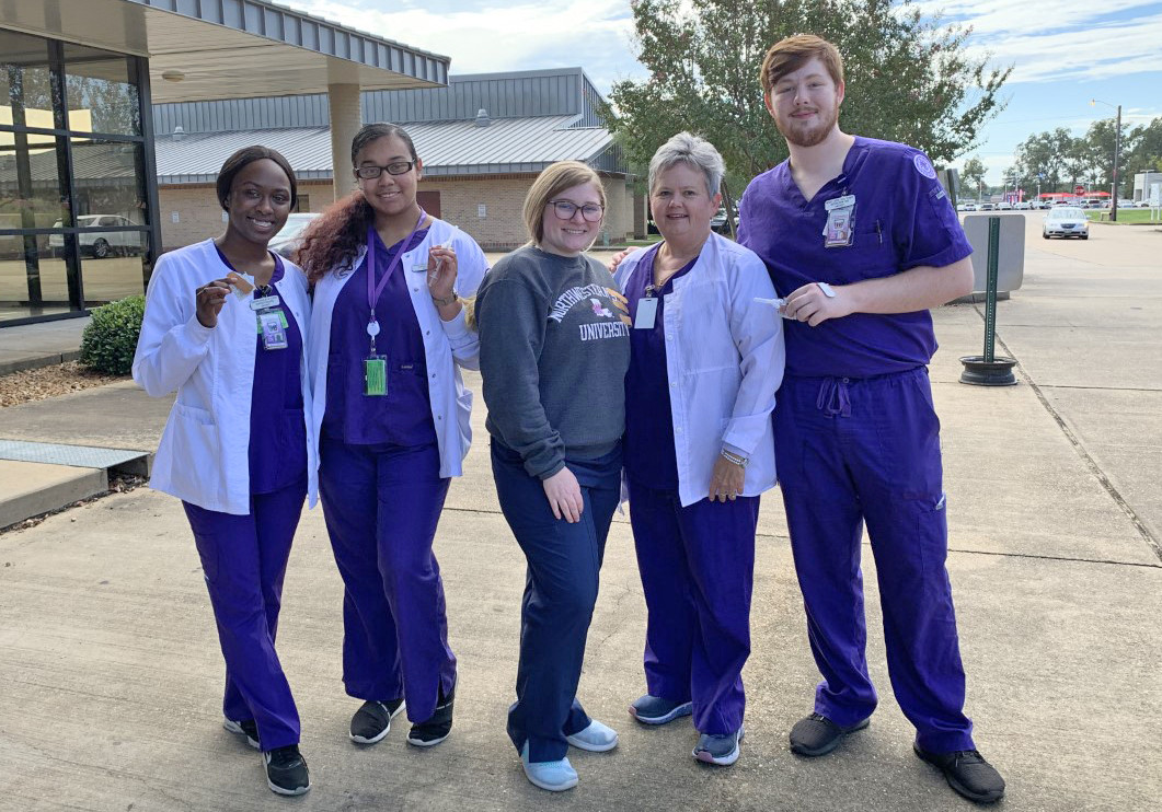 Nursing students volunteer at Drive Thru Flu Clinic – Northwestern State  University