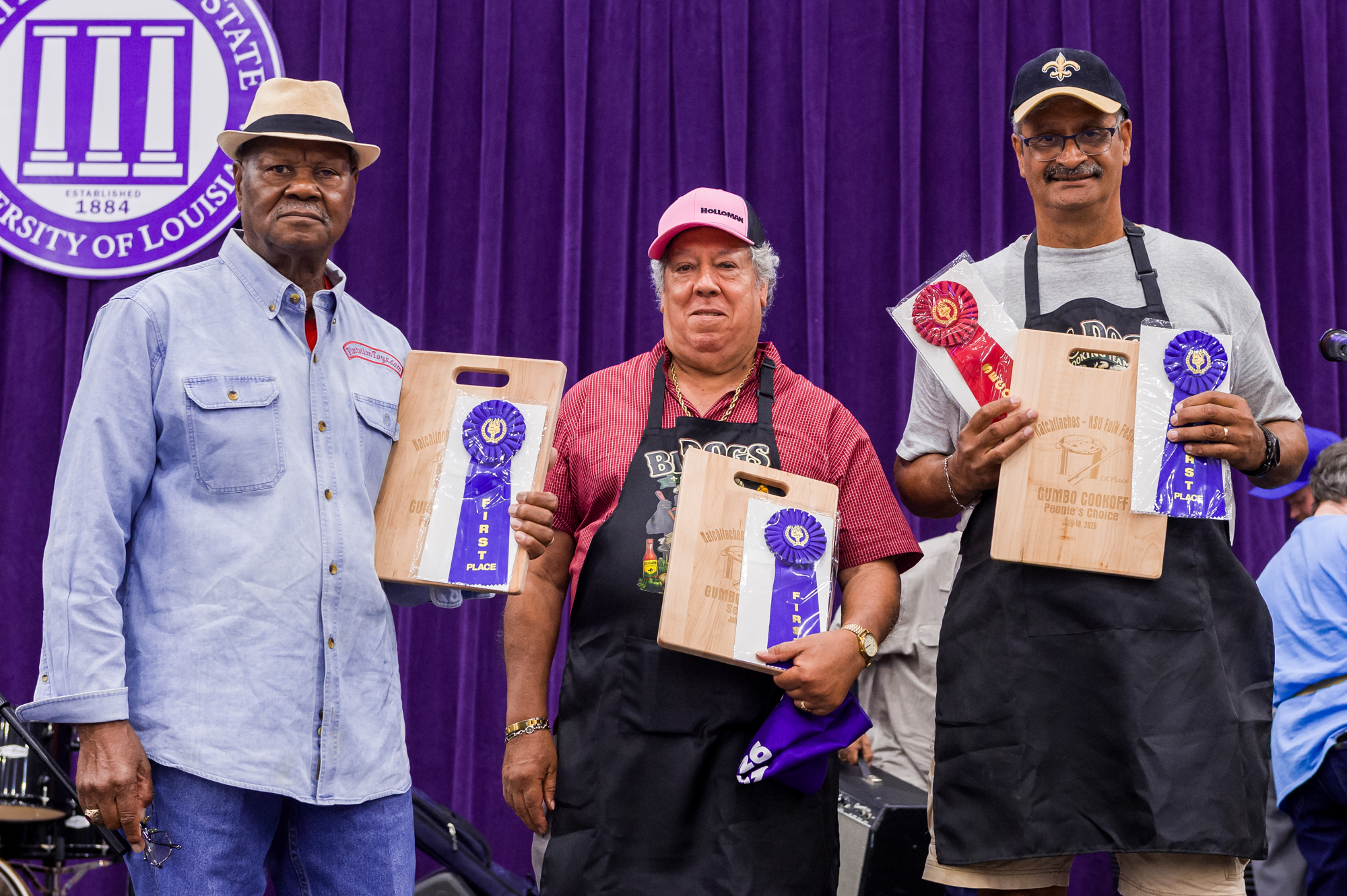 2026 Natchitoches-NSU Folk Festival Gumbo Cook-Off winners, left to right, Elvin Shields in poultry plus and Joey Sylvie and Jimmy Lawrence of the team Big Dog Cookers in the seafood and people’s choice categories.