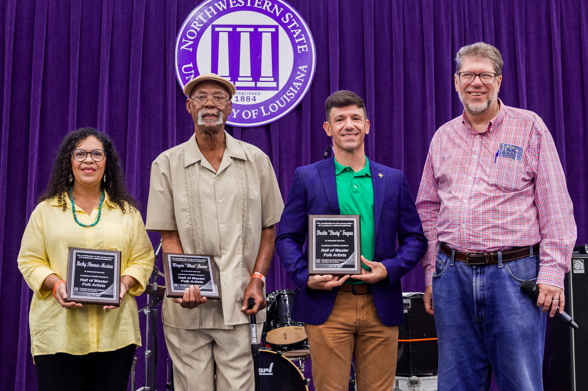 2026 Louisiana Folklife Center Hall of Master Folk Artists Inductees, from left, Becky Thomas-Meziere, Wayne Blue Burns and Dustin Fuqua with Louisiana Folklife Center director Dr. Shane Rasmussen.