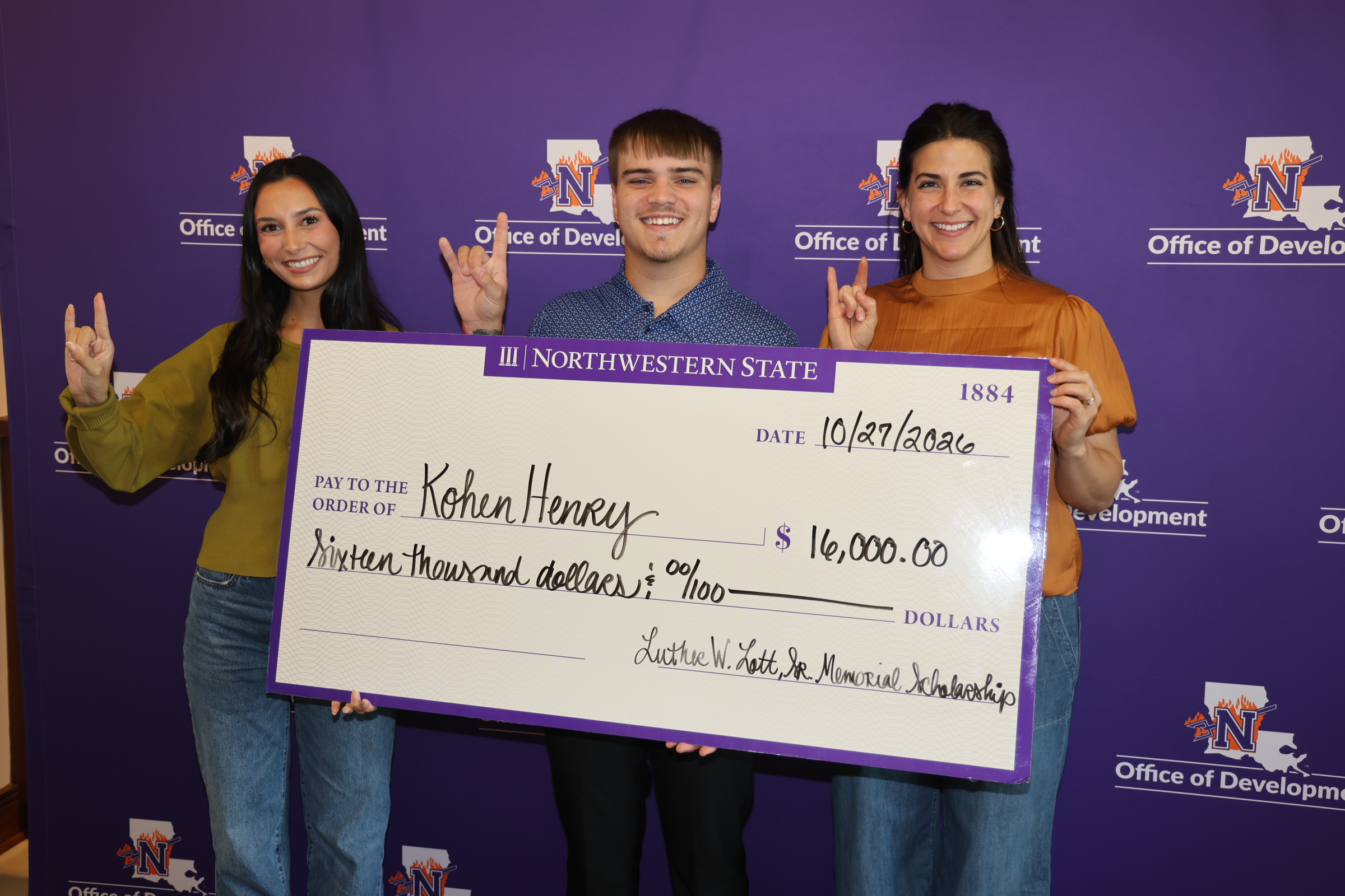 Kohen Henry of Tioga, center, is recipient of the 2026 Luther W. Lott Memorial Scholarship awarded to dependents of Lott Oil employees. From left are Kylie Descant Wiggins, Lott Oil retail marketing manager; Henry and Camille Lott Donahue, Lott Oil director of marketing.