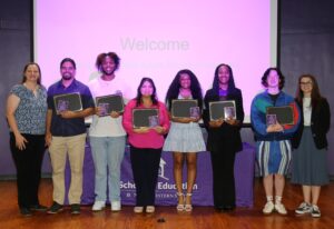 NSU Music Education majors were recognized with Apple pins. From left are Dr. Jennifer Pullig, Manuel Riego-Fernandez, Jordan Kirts, Allison Flore, Aliya Green, Morgan Hunter, Lauren Higginbotham and Dr. Molly Blair.